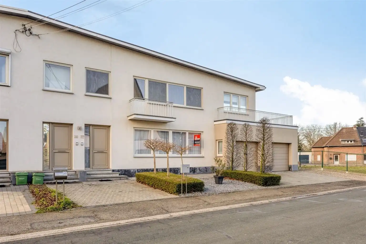 Zeer ruim 4-slaapkamerappartement met ruime terrassen en een afgesloten garage, gelegen nabij het centrum van Maaseik. foto 21