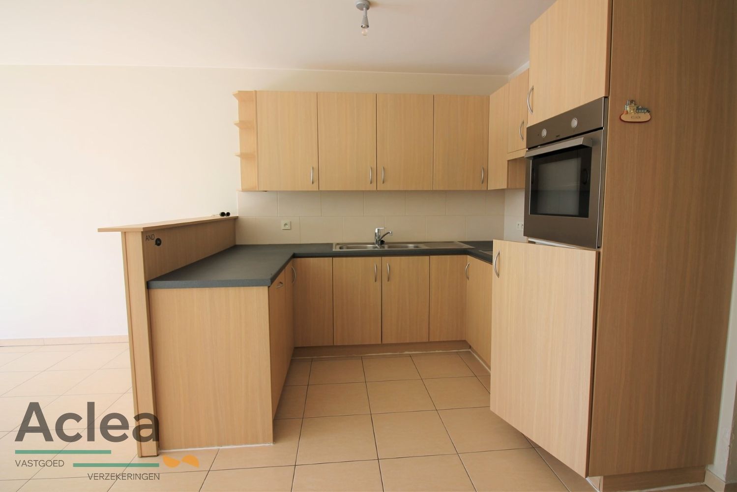 gezellig gelijkvloers appartement met terras foto 2