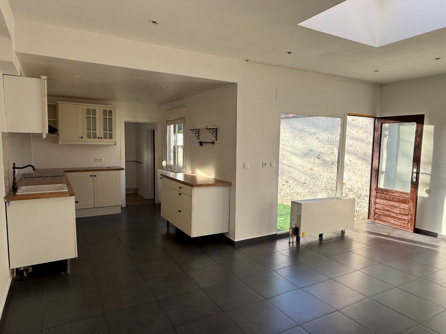 Verzorgd gelijkvloers 1-slpk appartement met tuin foto 6