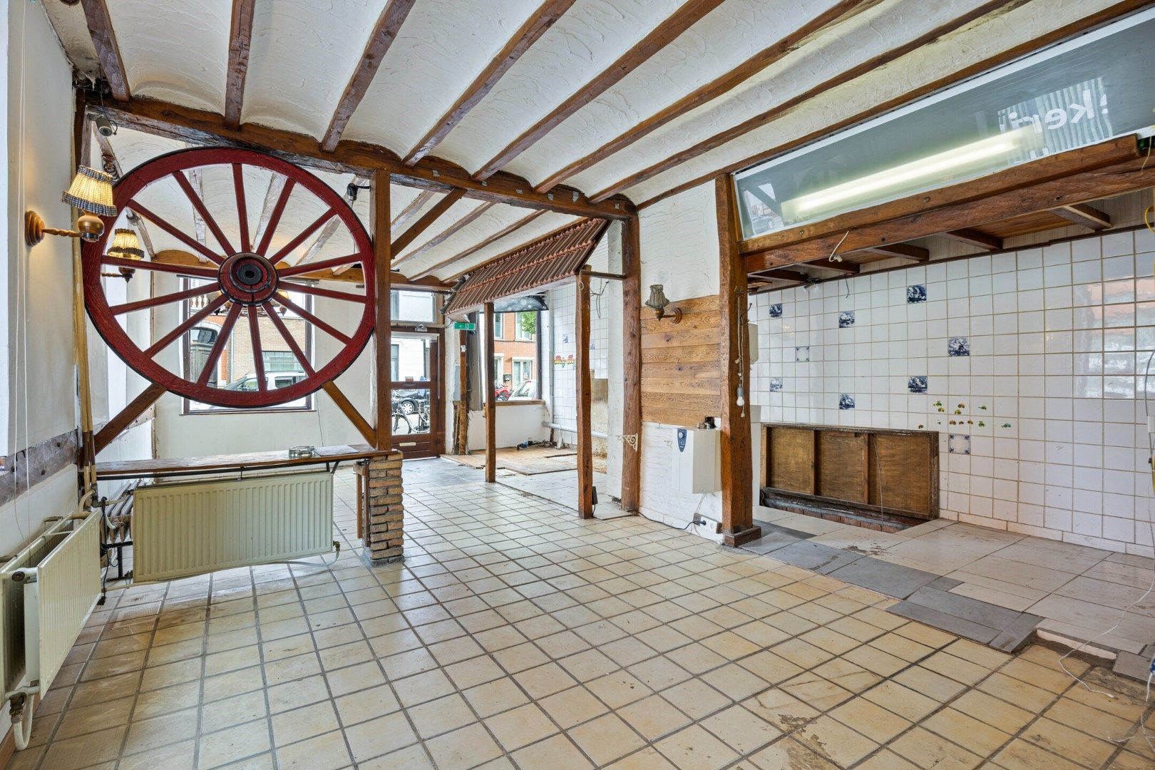 Halfopen hoekwoning met garage en dakterras op toplocatie in Kessel-Lo – renovatieproject met veel potentieel foto 6