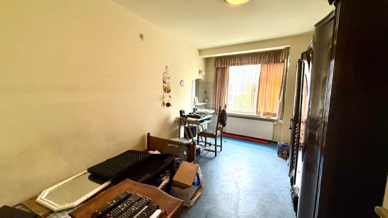 Gezellig en verrassend ruim appartement met 2 slaapkamers en veel potentieel in het hart van Deinze foto 5