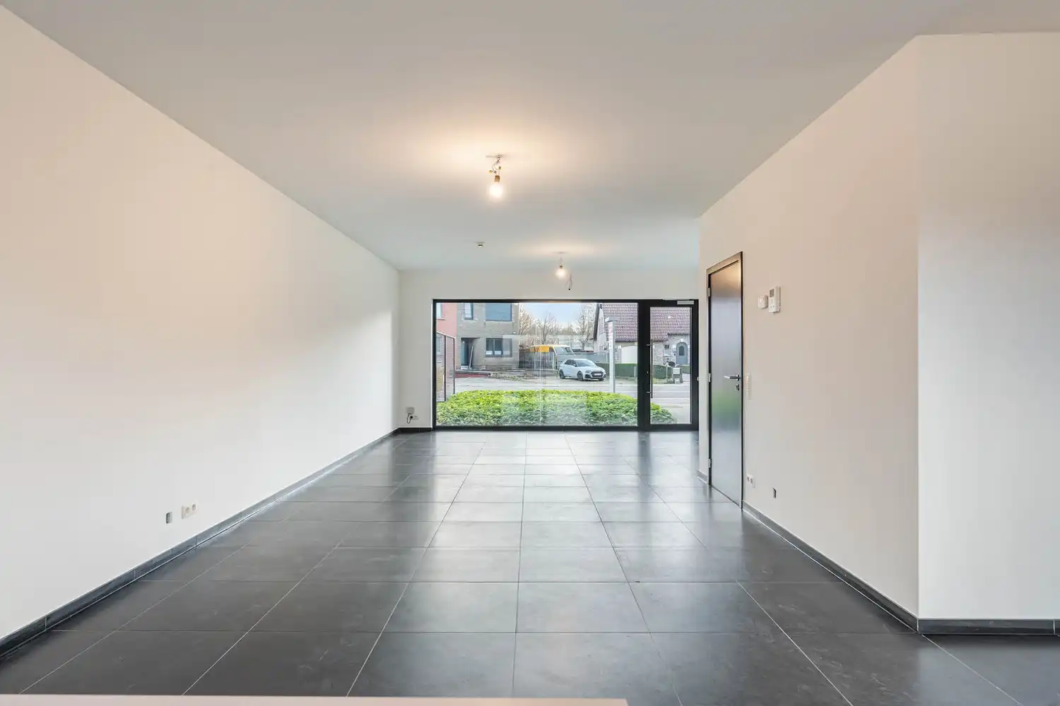 Recente, polyvalente en lichtrijke handelsruimte met 3 private autostaanplaatsen op een commercieel gunstige ligging te Kessel-Lo! foto 14