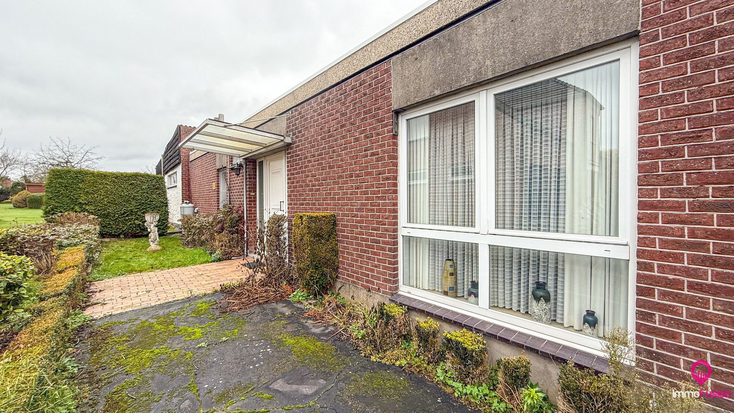 Bungalow met grote werkplaats en weide op 42 are in Alken foto 41