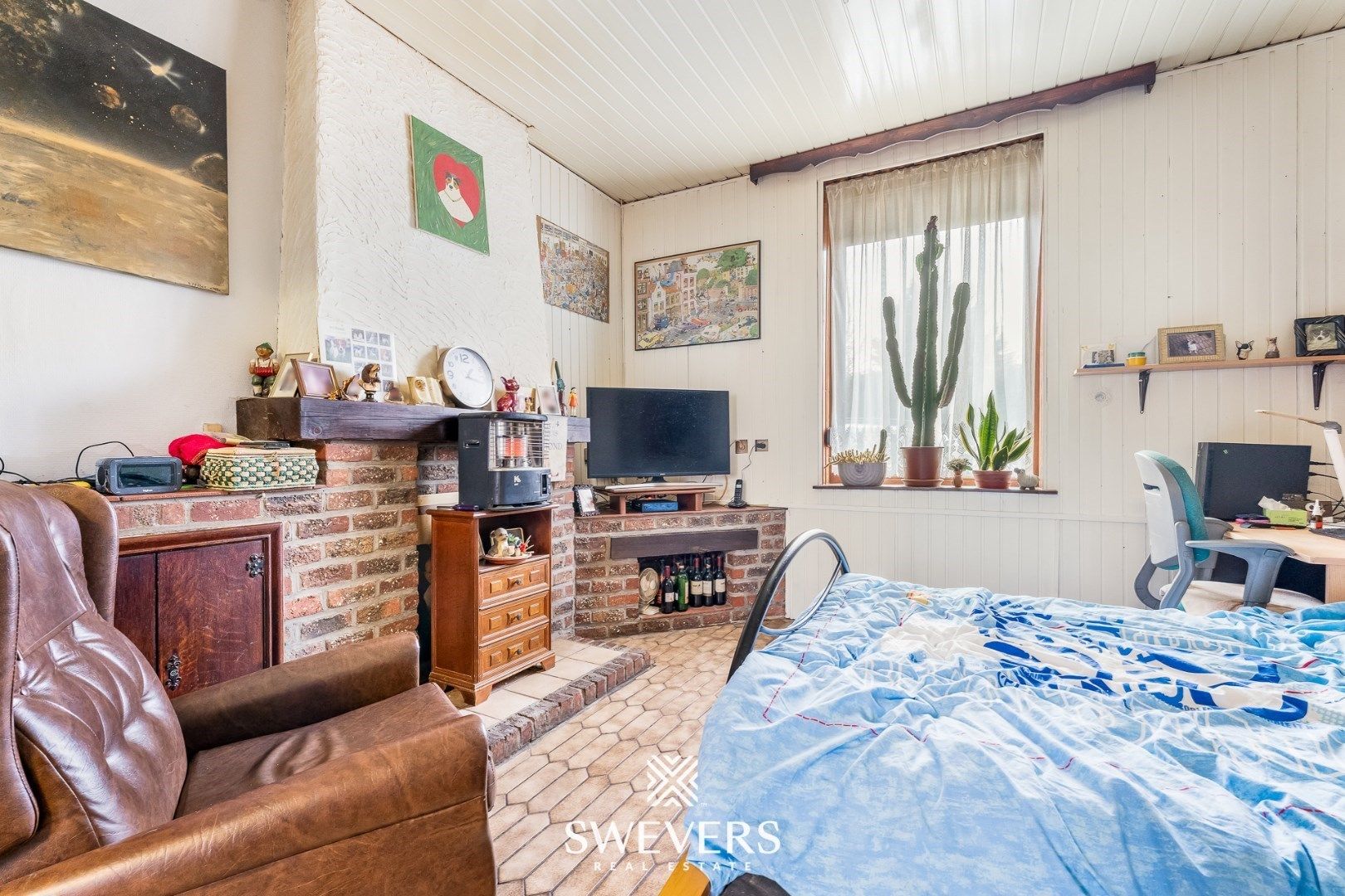Charmante halfopen woning met renovatiepotentieel in Sint-Truiden foto 10