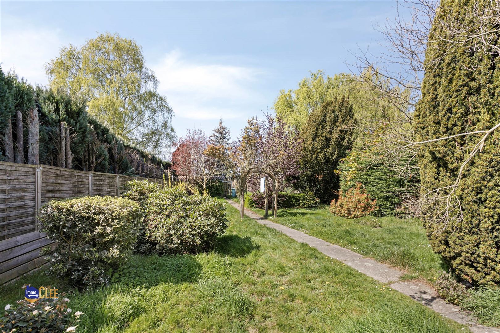 Karaktervolle gezinswoning in Brustem met ruime tuin & veel potentieel foto 24