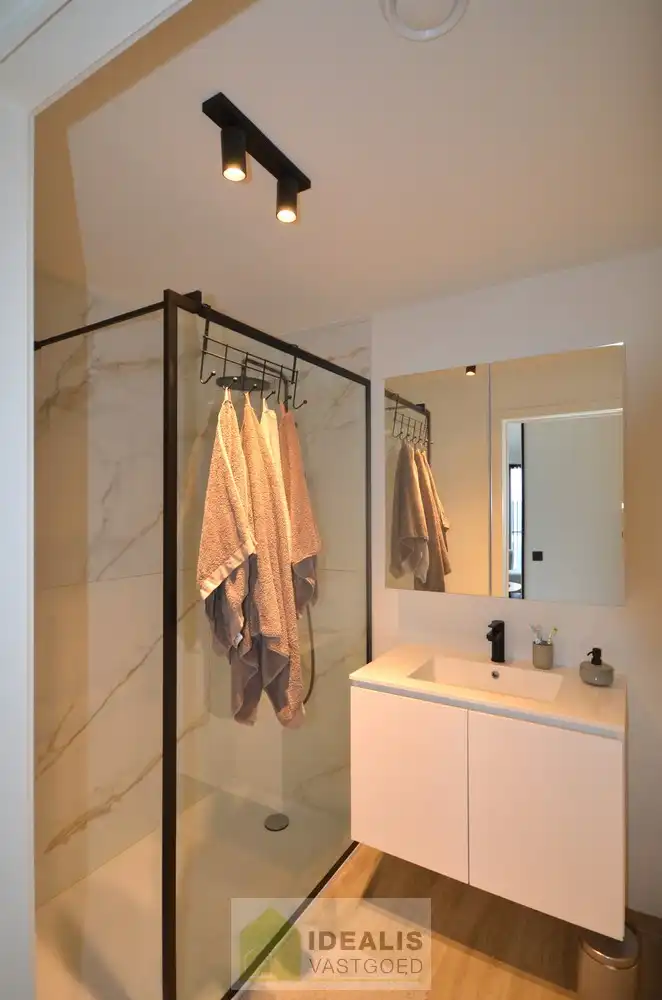 IDEALIS VASTGOED – INSTAPKLAAR APPARTEMENT MET KELDERBERGING EN ONDERGRONDSE AUTOSTAANPLAATS foto 7