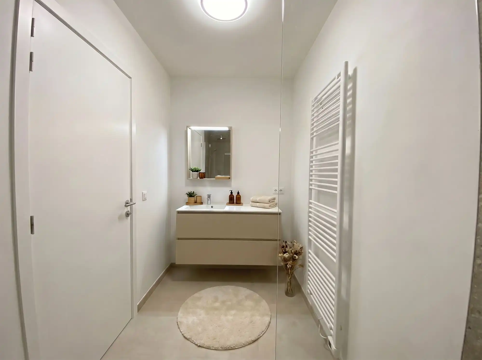 Gelijkvloers nieuwbouwappartement met garage en berging foto 13