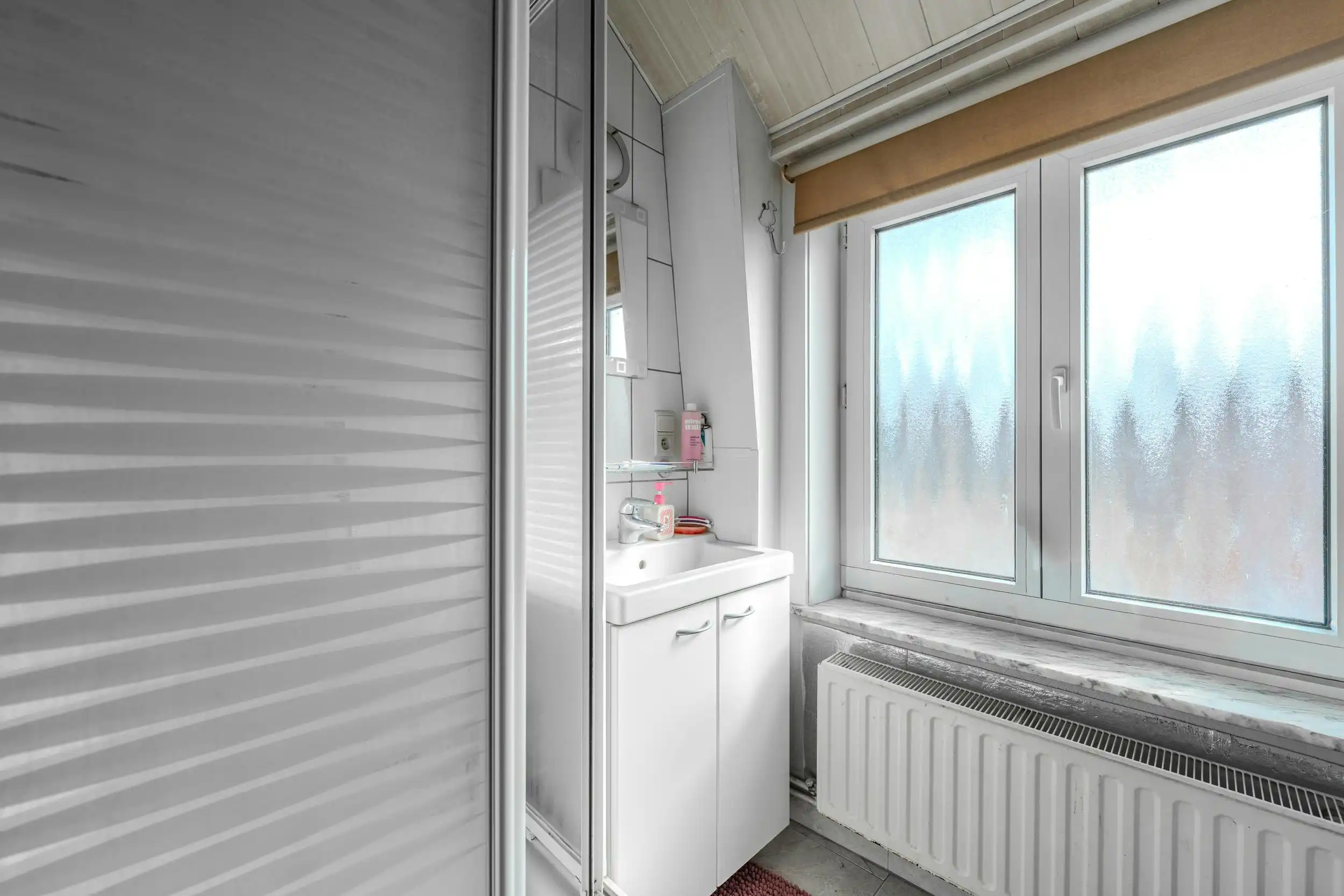 Lichtrijke bel-etage woning met drie slaapkamers te Oostende foto 9