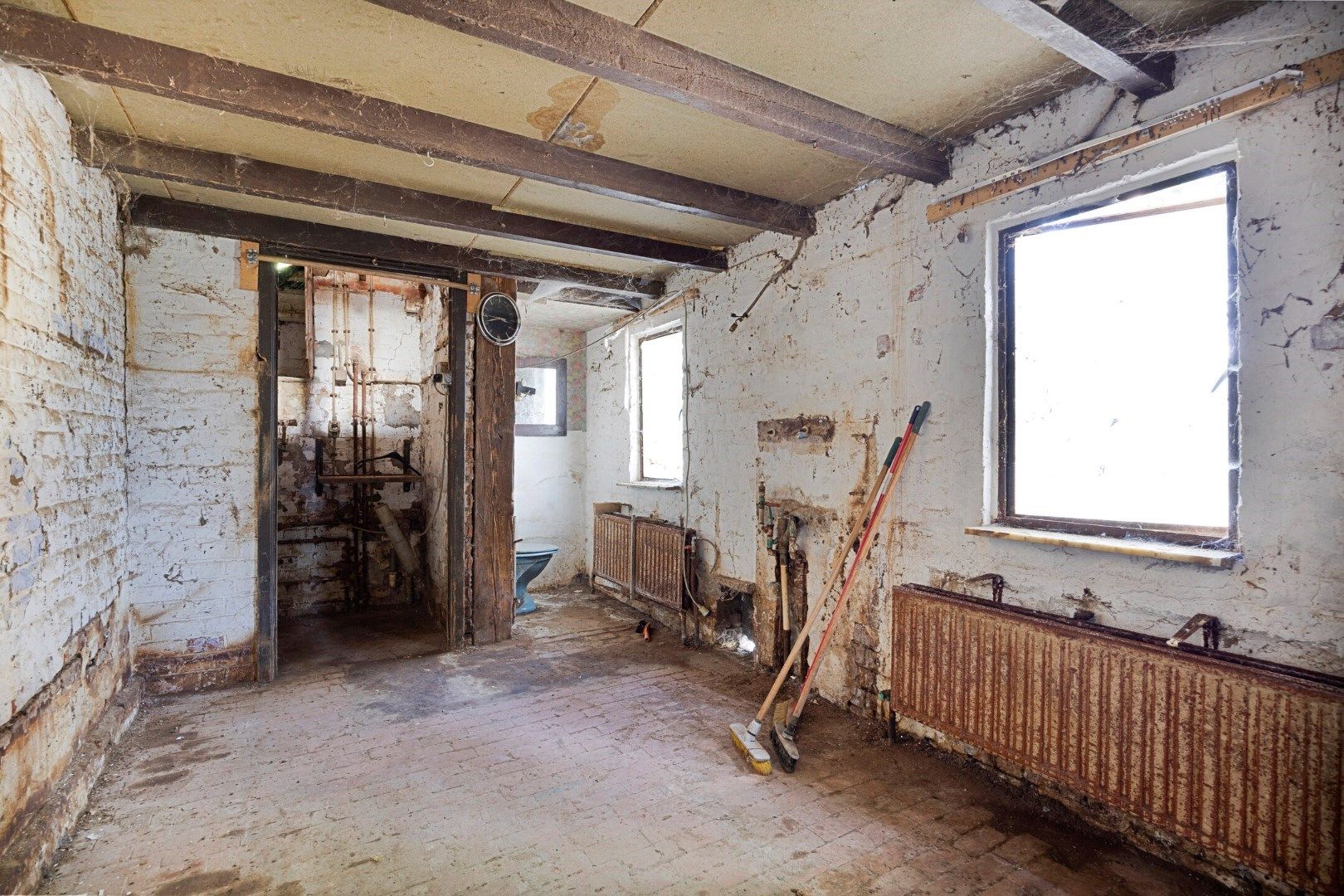 Te renoveren halfopen bebouwing met 3 slaapkamers en ruime tuin in hartje Kessel-Lo  foto 8