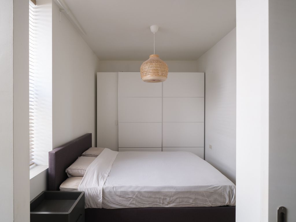 Hedendaags gelijkvloers appartement met één slaapkamer en stadstuin, gelegen in de voormalige brandweerkazerne en de vroegere kunstacademie, midden in het historisch hart van Gent. foto 18