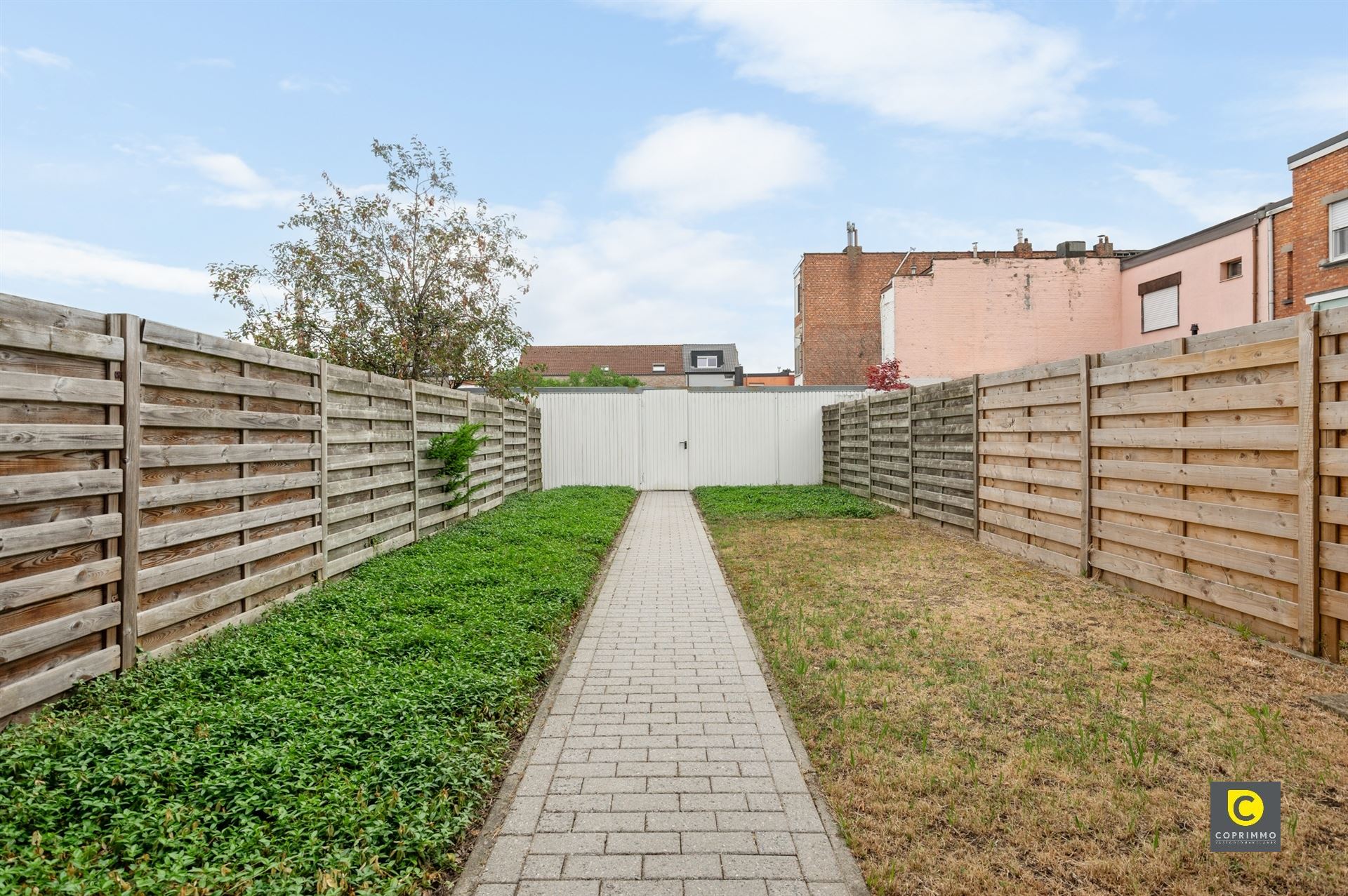 Gelijkvloers app met 2 slpk, tuin en garagebox foto 9