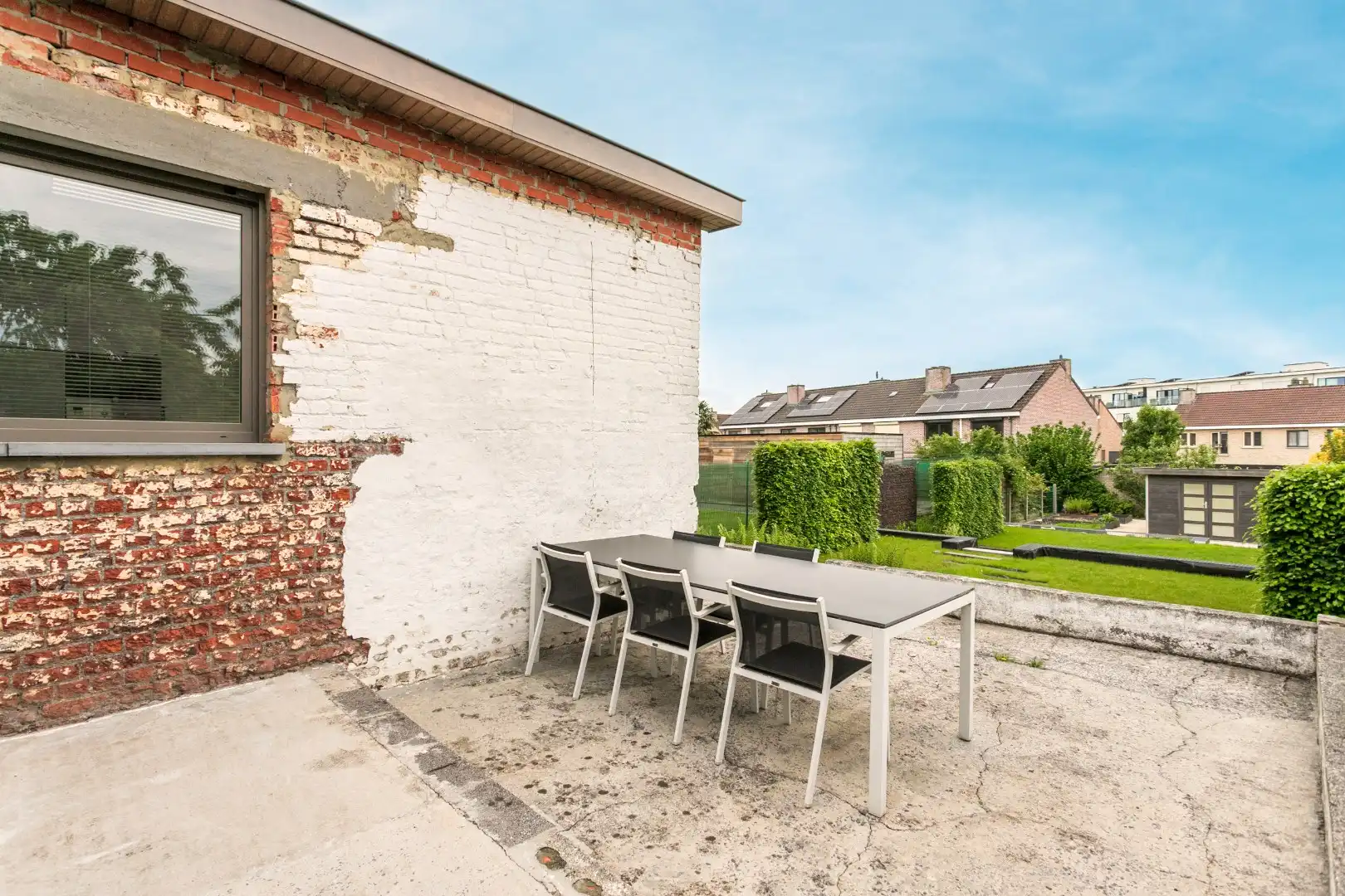 Deels gerenoveerde woning met tuin en garage op gunstige ligging te Halle foto 14