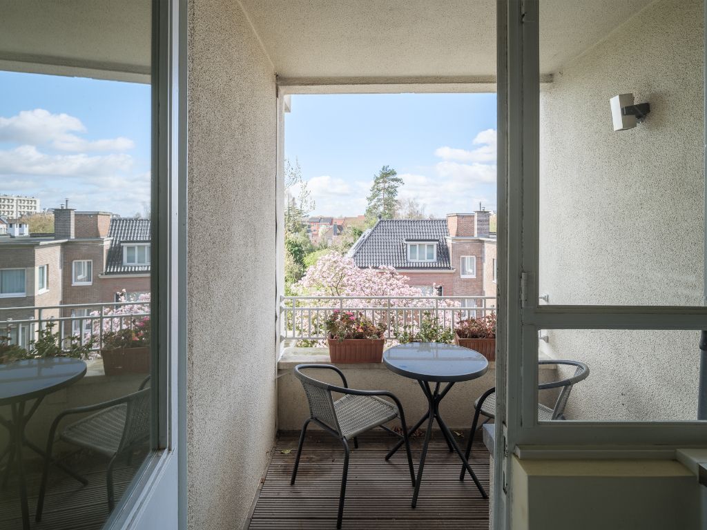 Lichtrijk appartement met 2 volwaardige slaapkamers, inpandig terras en gemeenschappelijke tuin, in een residentiële straat nabij het station Gent-Sint-Pieters. foto 7