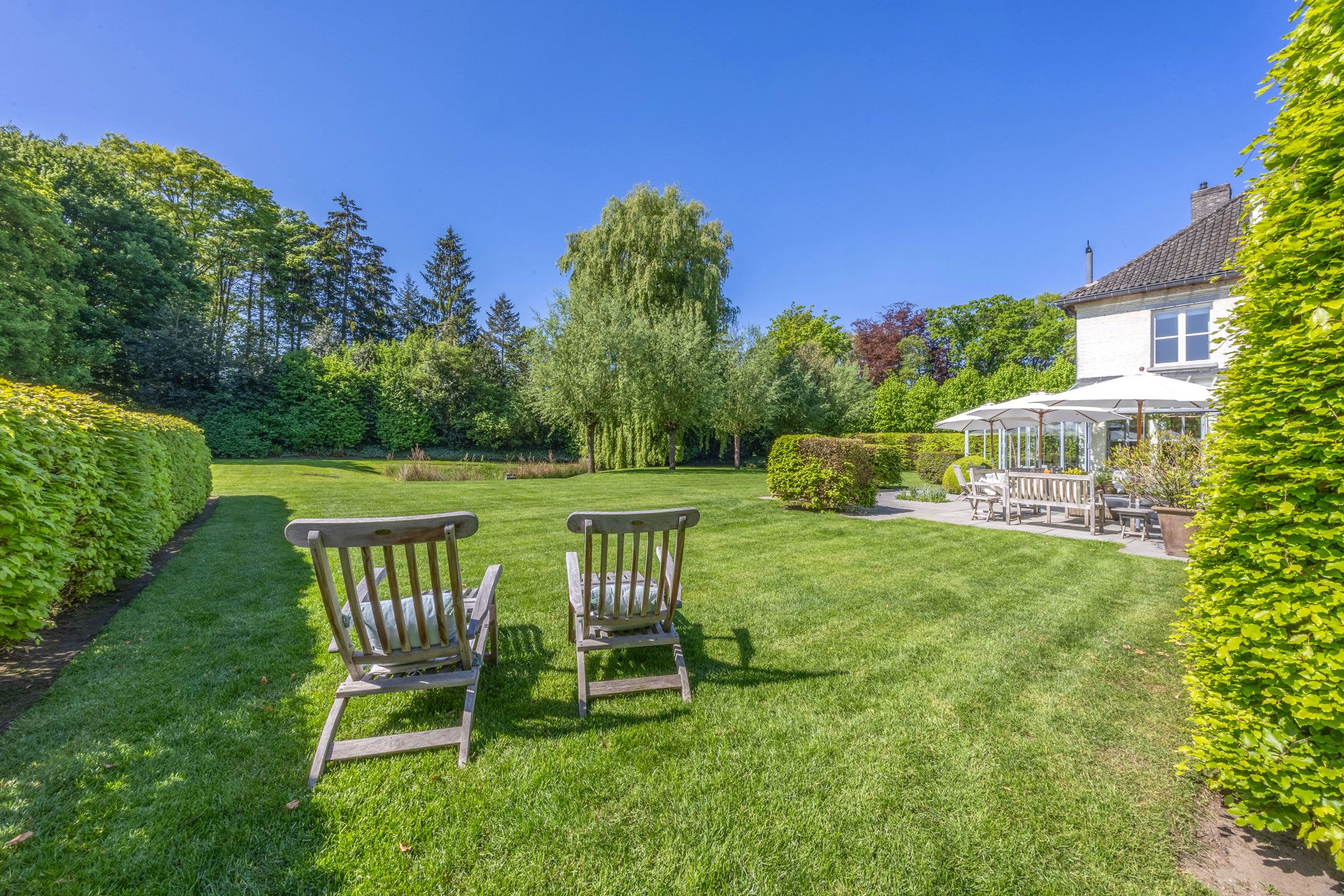 Unieke parel op royaal perceel (3.877 m²) met bouwgrond foto 36