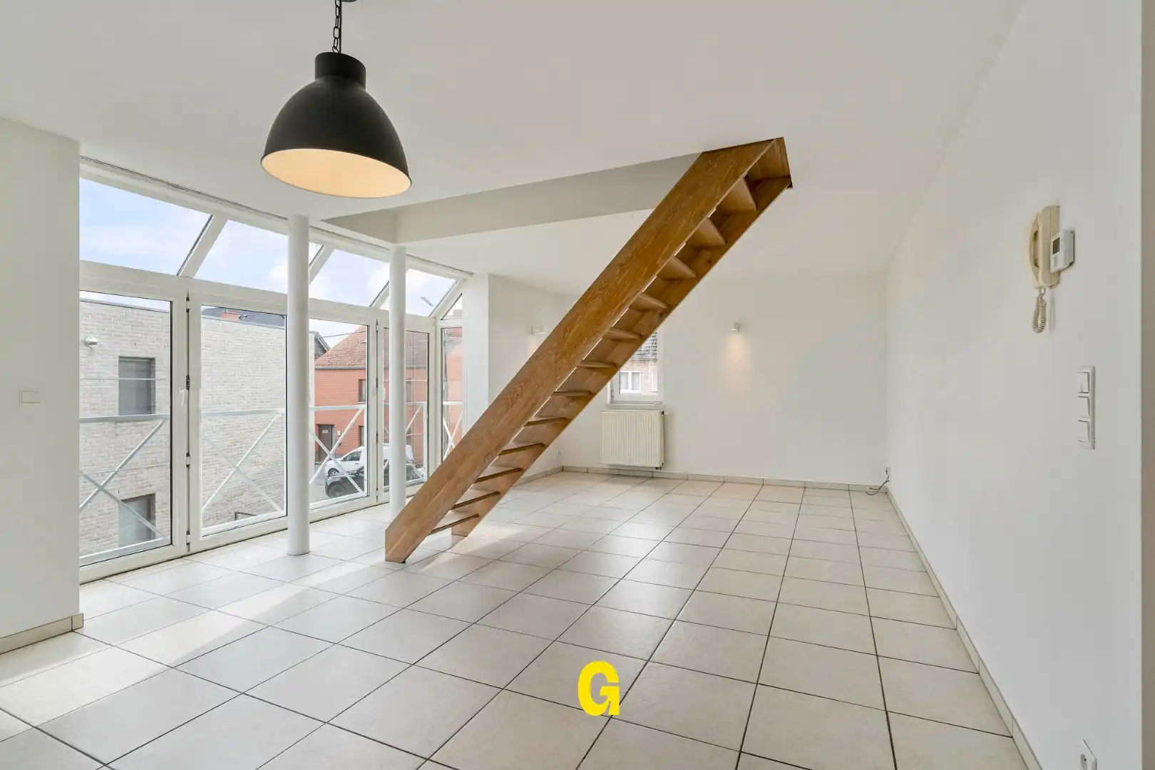 *** VERKOCHT *** Aangenaam duplexappartement met drie slaapkamers, autostandplaats en kelderberging foto 9
