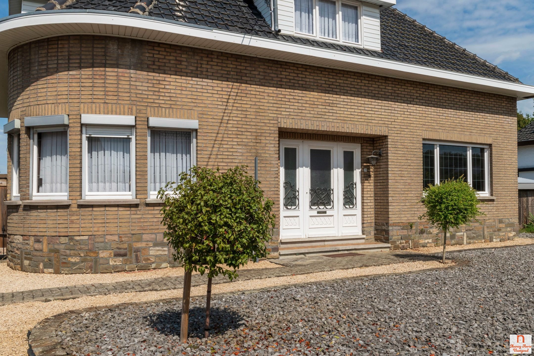 Sfeervolle jaren ’60-woning met grote tuin in rustige straat foto 31