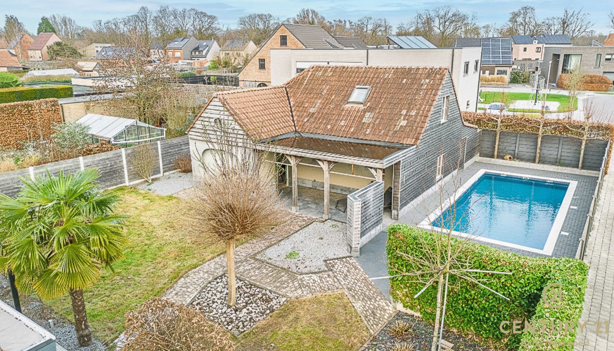 Stijlvolle vrijstaande woning met zwembad, poolhouse en tuin foto 25