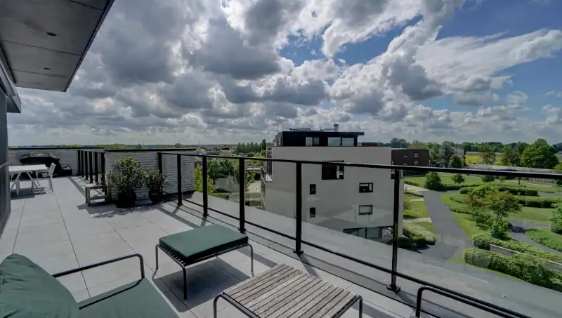 Exclusieve penthouse 137m² + dakterras 86m² in parkdomein foto {{pictureIndex}}