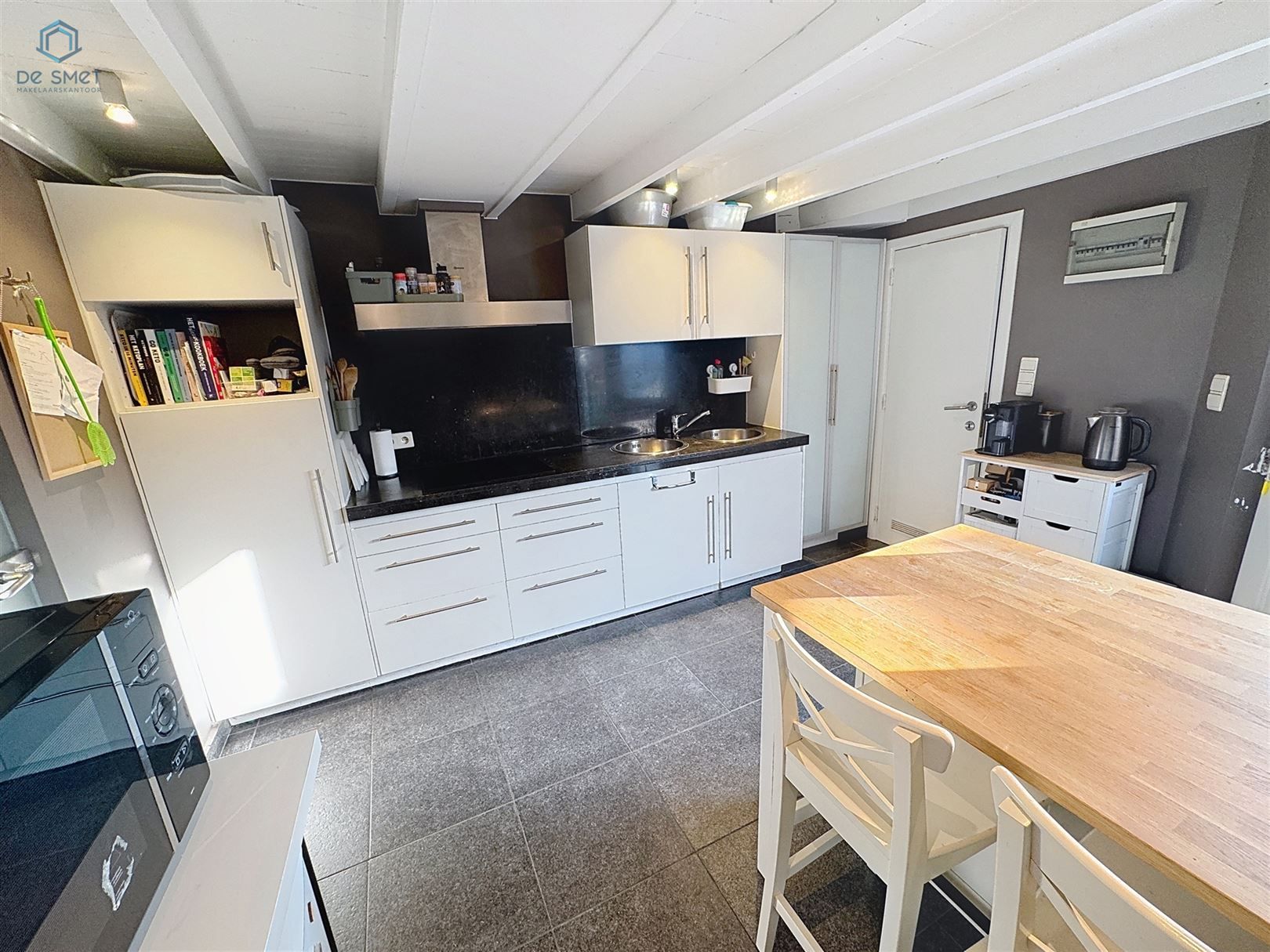 Instapklare woning met 2 slaapkamers, terras, carport en berging in Ophasselt foto 4