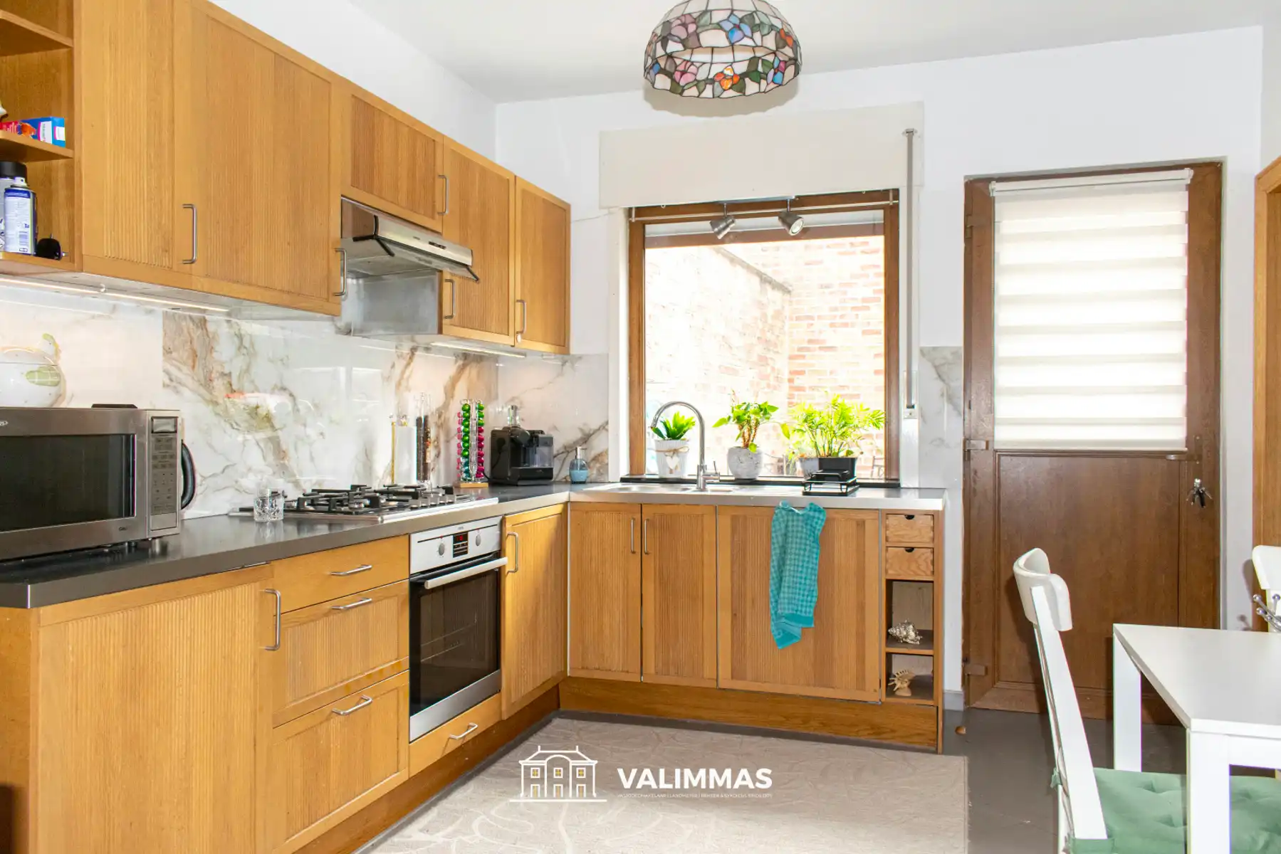 Ruime, instapklare woning met bijgebouw/studio en grote tuin foto 9