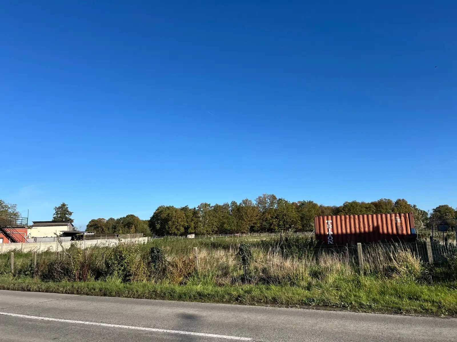 Bouwgrond voor OB (1.235m²) met achteraan agrarisch gebied foto 2