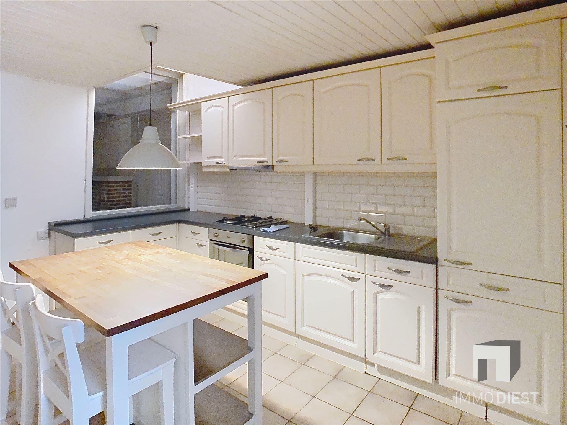 Gezellige rijwoning met terras en tuin foto 7