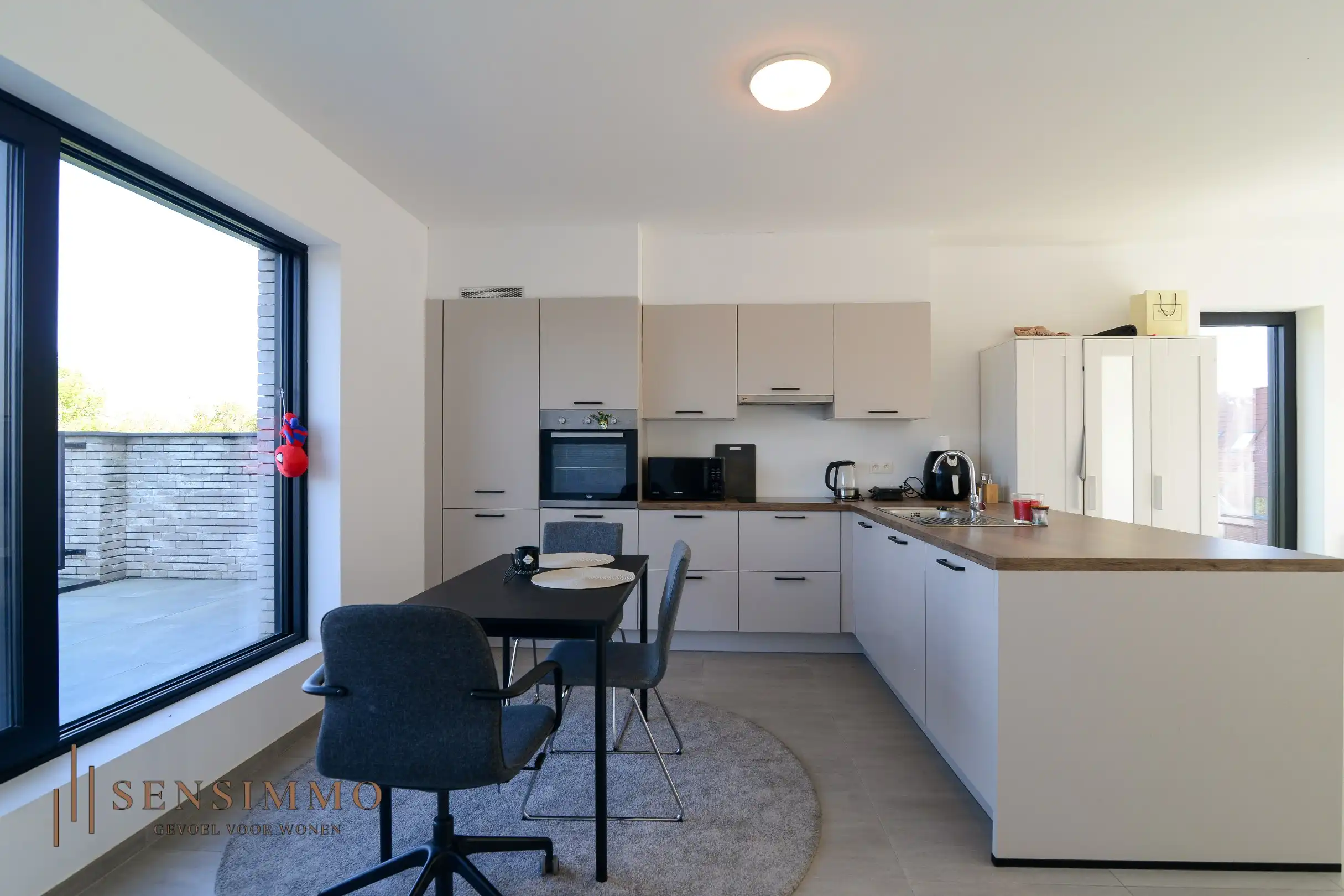 Instapklaar & energiezuinig 1-slaapkamerappartement met 2 terrassen en parking in Maasmechelen foto 4