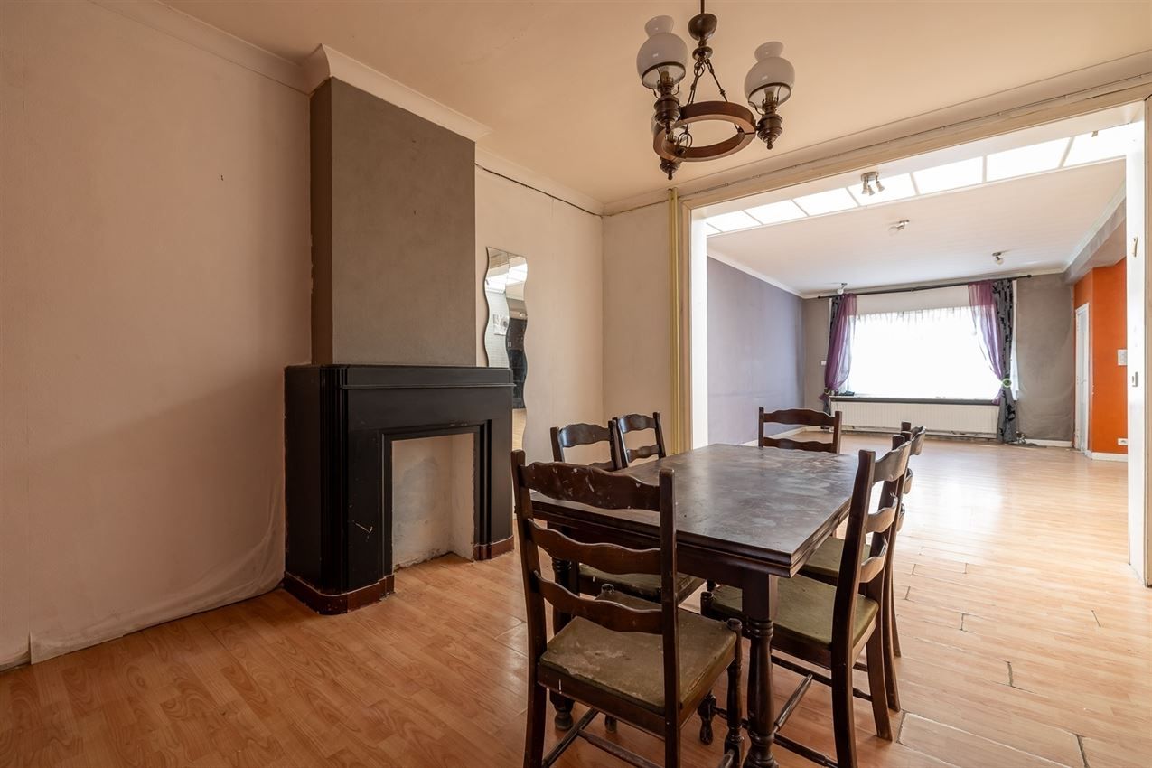 Ruime woning met zuidgerichte tuin en garage in rustige straat nabij centrum. EPC C en 5+ slaapkamers. foto 7