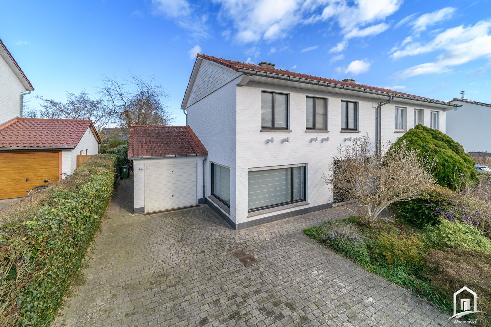 Instapklare halfopen bebouwing met tuin en garages in Denderleeuw foto 34