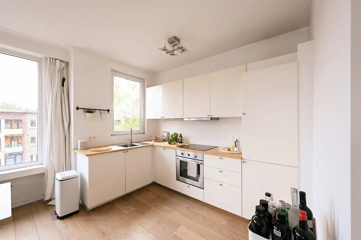 Supergezellig lichtrijk hoekappartement met 2 slpk foto 10