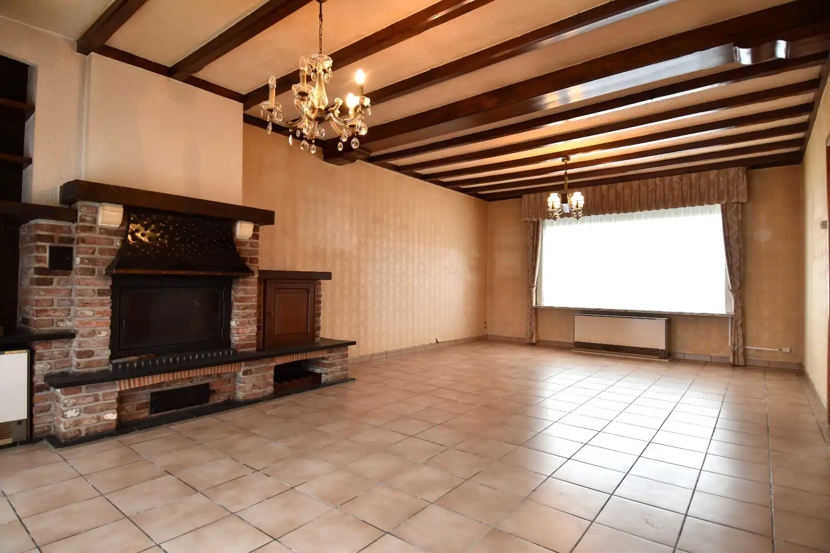 Halfopen bebouwing met 2 slaapkamers, garage en tuin in landelijke omgeving te koop in Gullegem foto 2