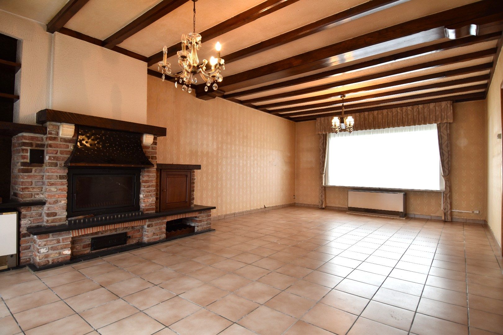 Halfopen bebouwing met 2 slaapkamers, garage en tuin in landelijke omgeving te koop in Gullegem foto 3