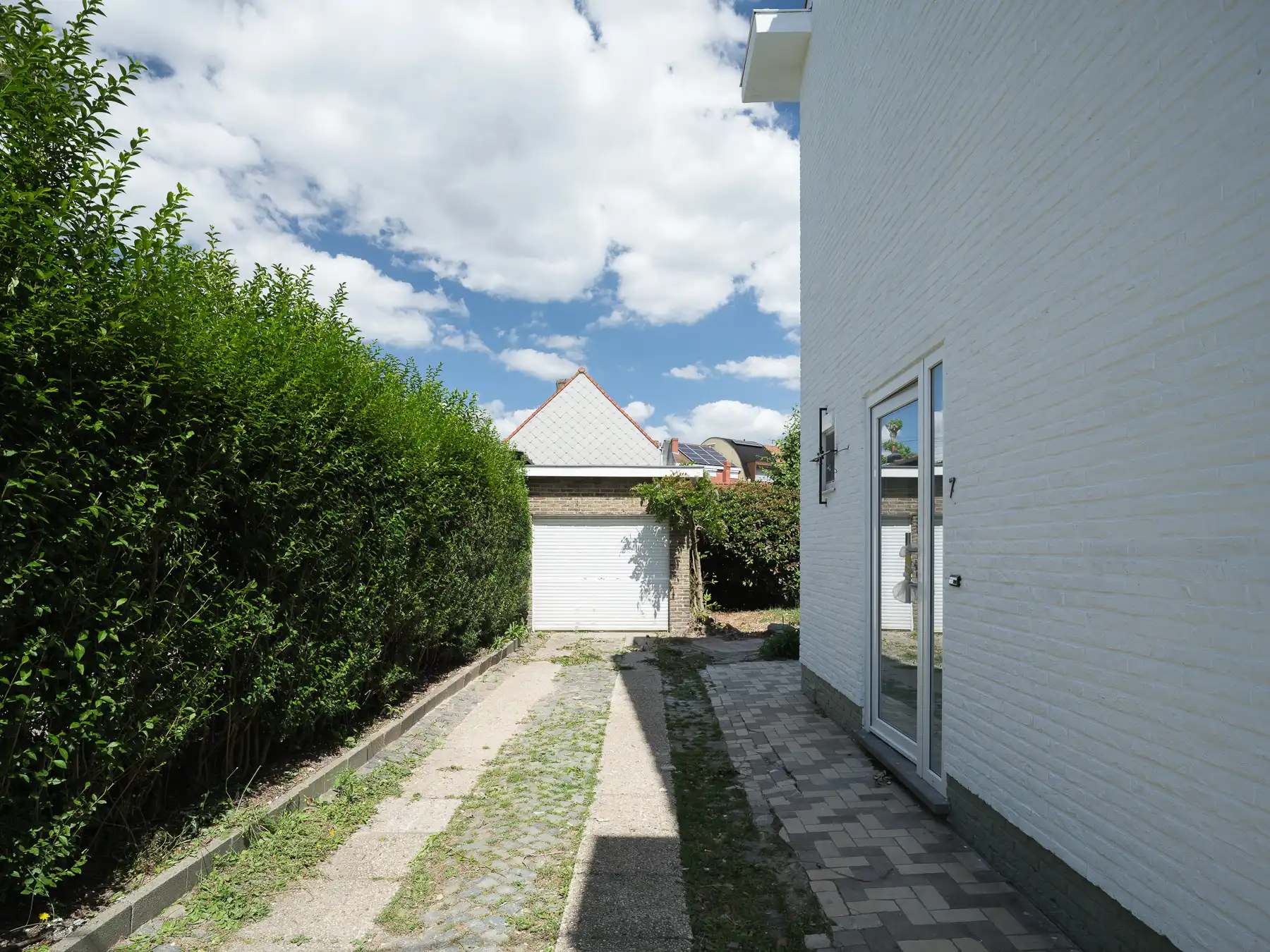 Ruime halfopen bebouwing met tuin foto 22