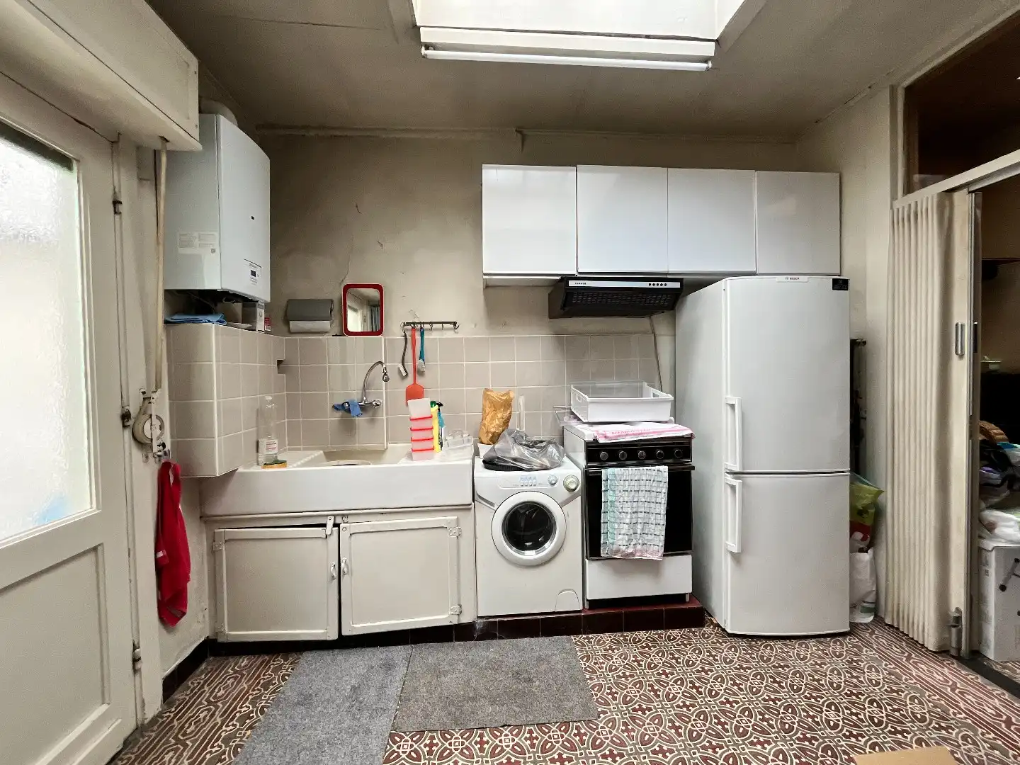 Te renoveren stadswoning met 4 slpk, koer en garage foto 11