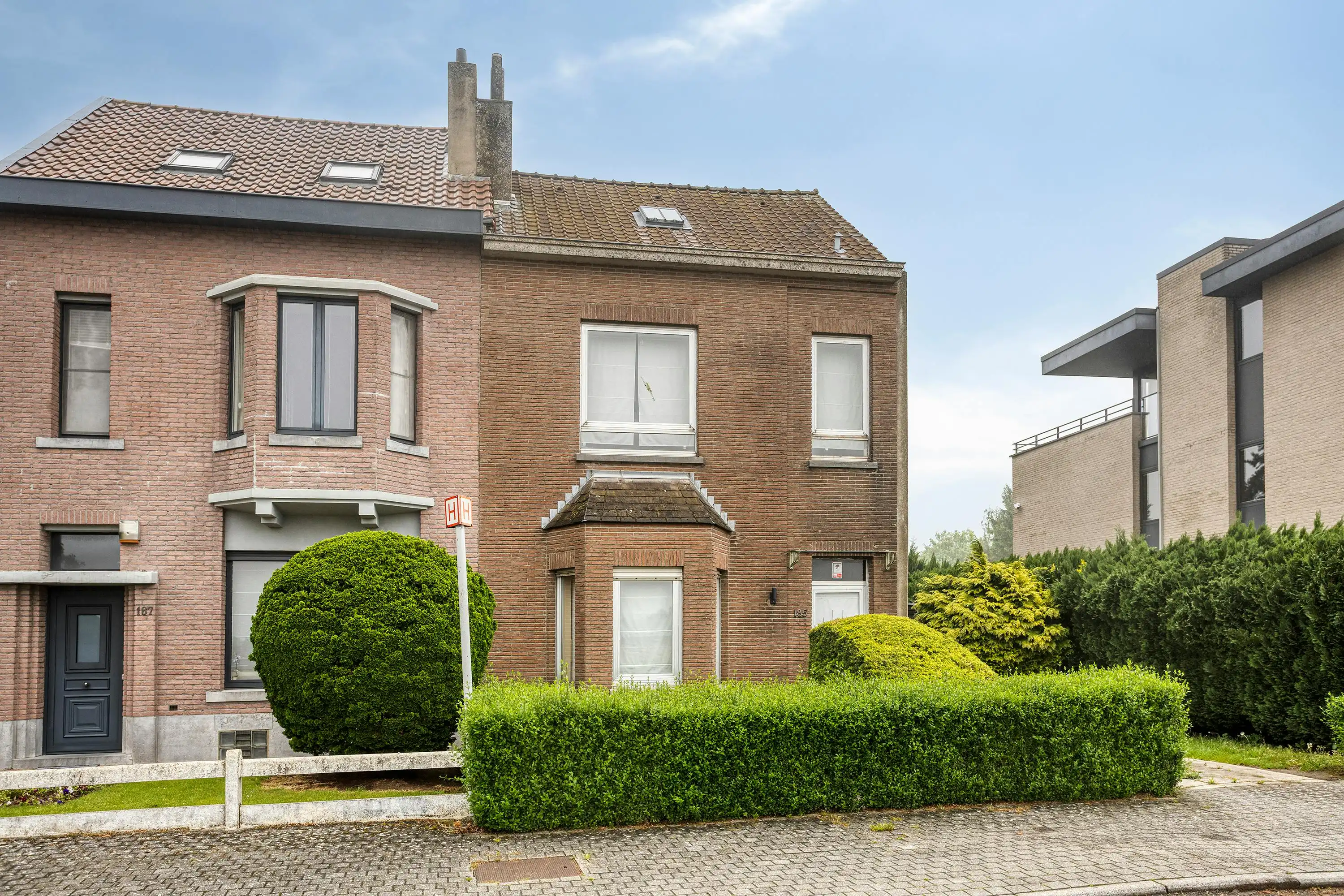 3-gevelwoning met veel potentieel en uitzonderlijke tuin (Grens Dilbeek) foto 2