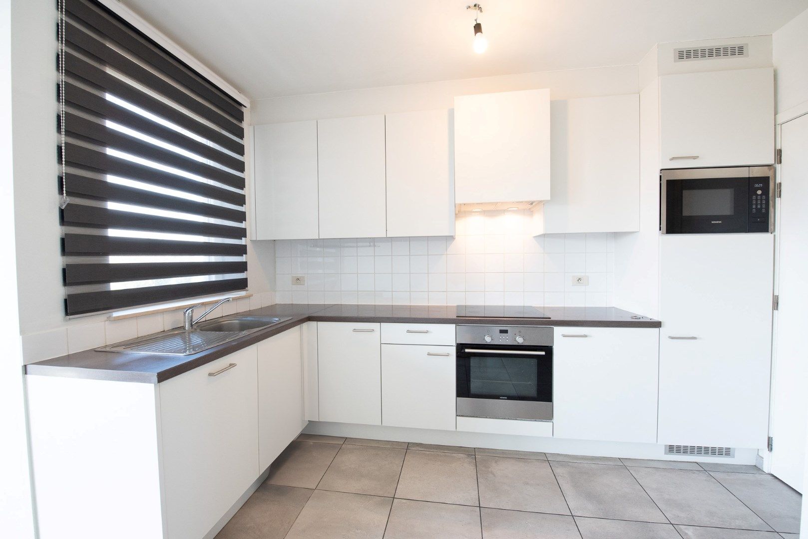 Instapklaar duplex-appartement te Zulte. foto 4