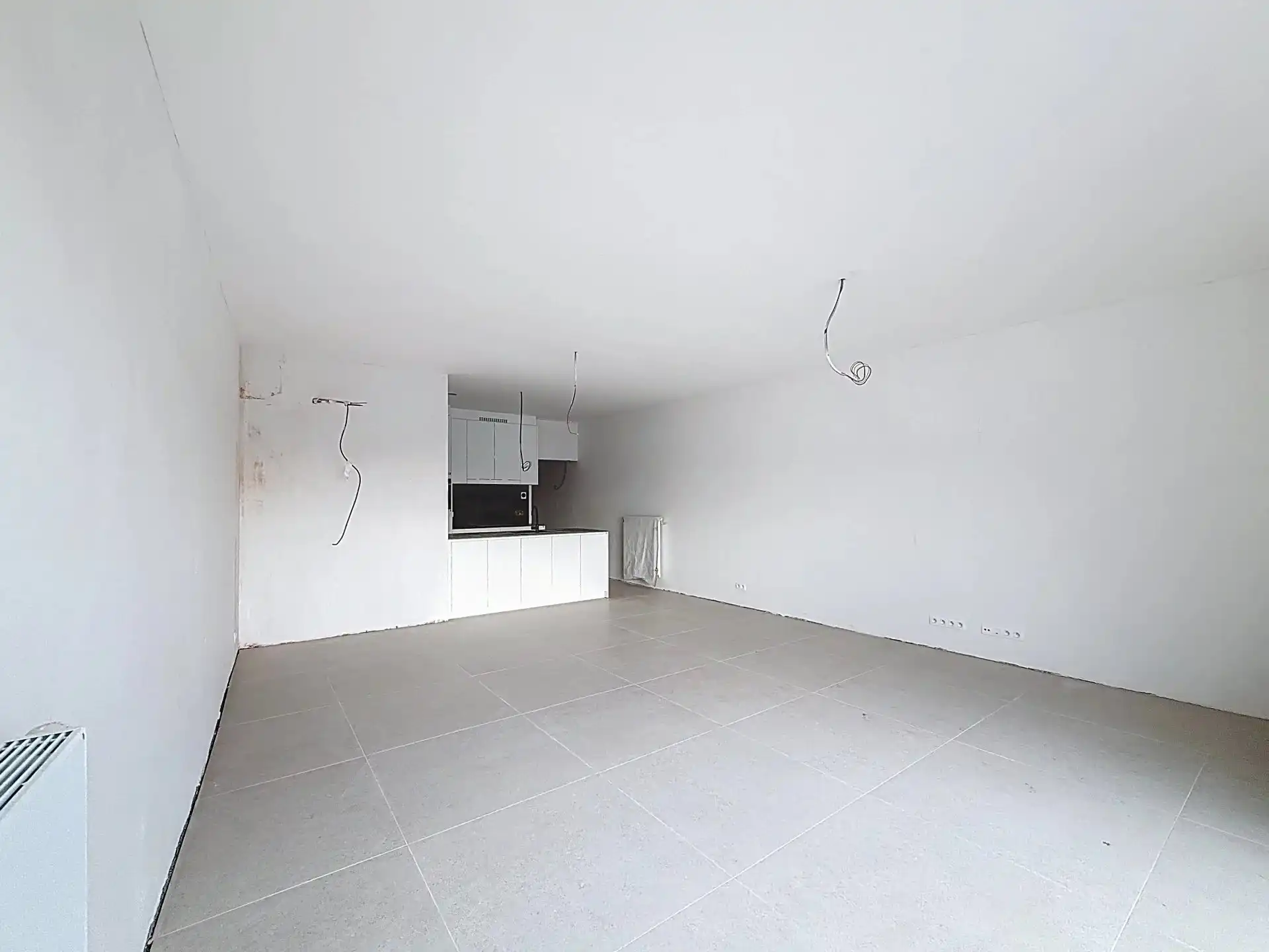 Luxueus en modern afgewerkt gelijkvloers appartement met tuin, 1 slaapkamer en 2 staanplaatsen. foto 2