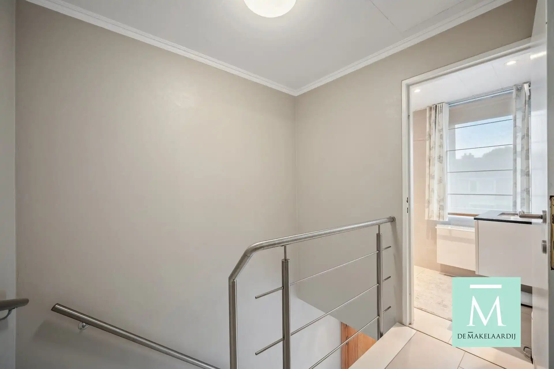 Volledig gerenoveerde woning met aangename tuin  foto 15