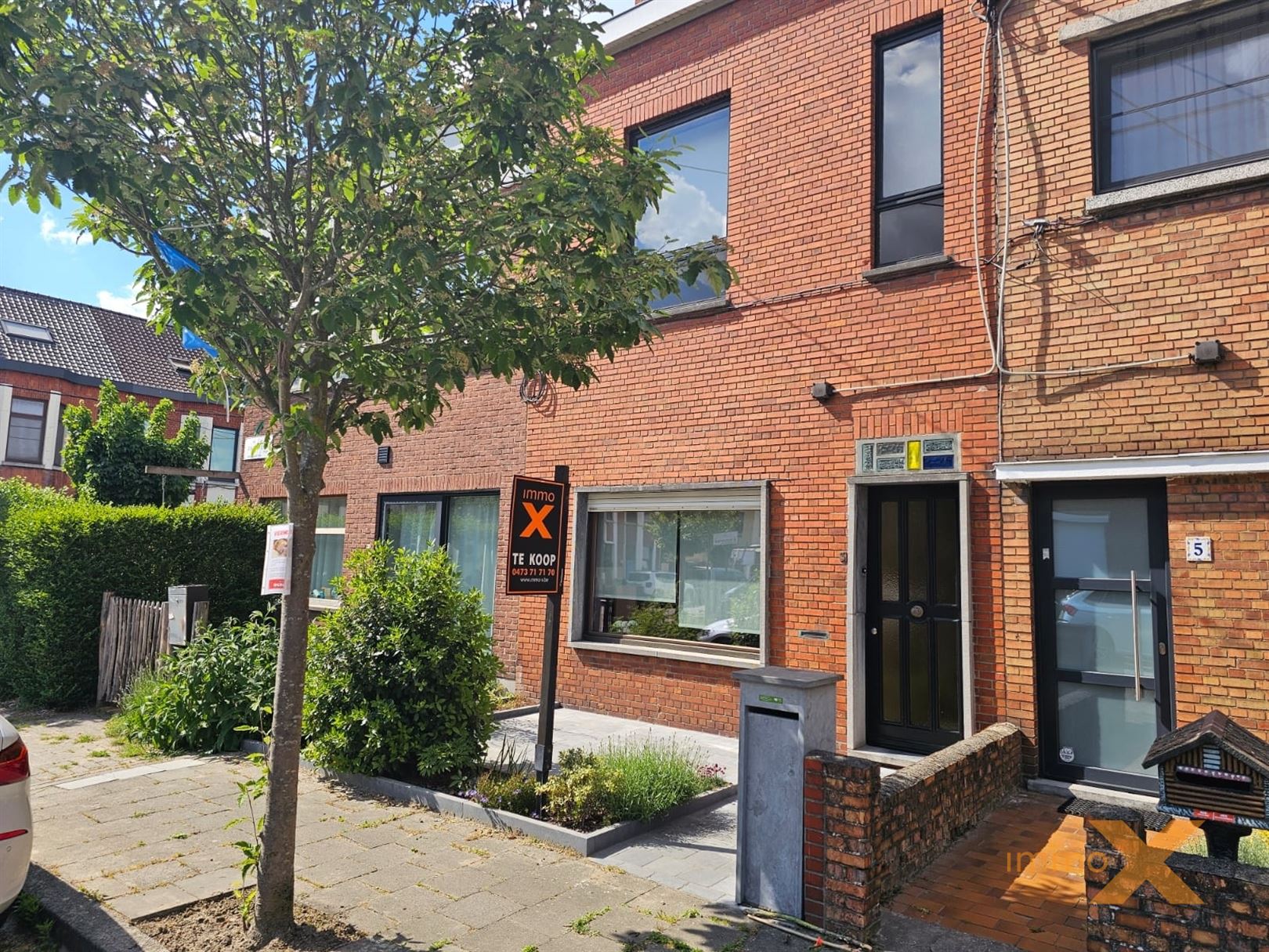 Hoofdfoto van de publicatie: CHARMANTE WONING MET TUIN EN GARAGE