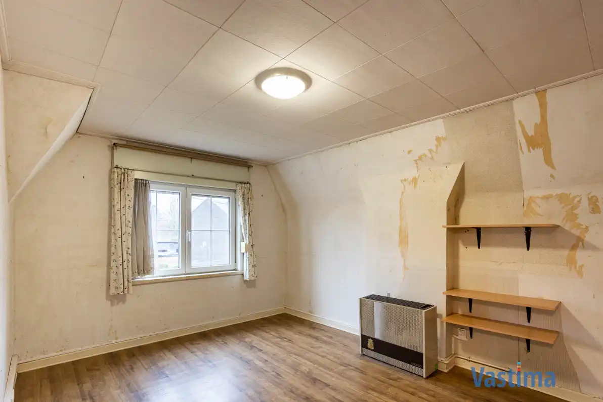 Te renoveren, halfopen woning met zuid gerichte tuin foto 17