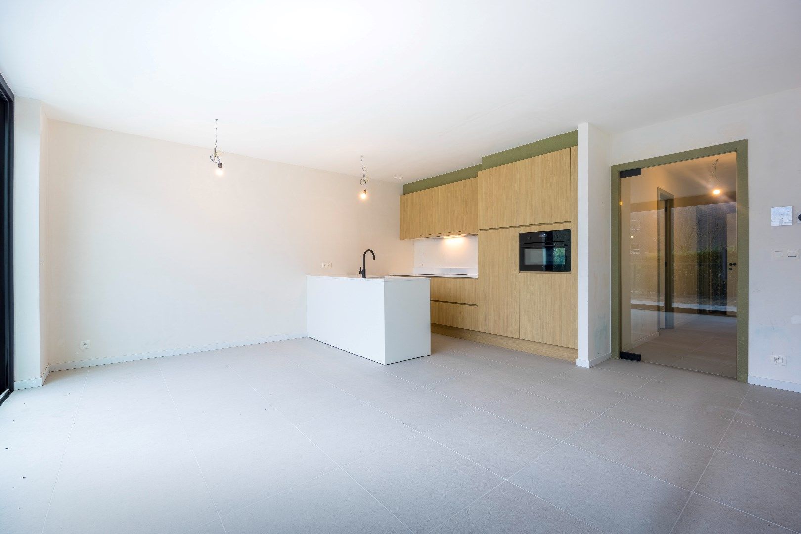 Nieuwbouw gelijkvloers appartement met zonnige tuin gelegen in "Residentie Dunique" te Bredene - duinen! foto 2