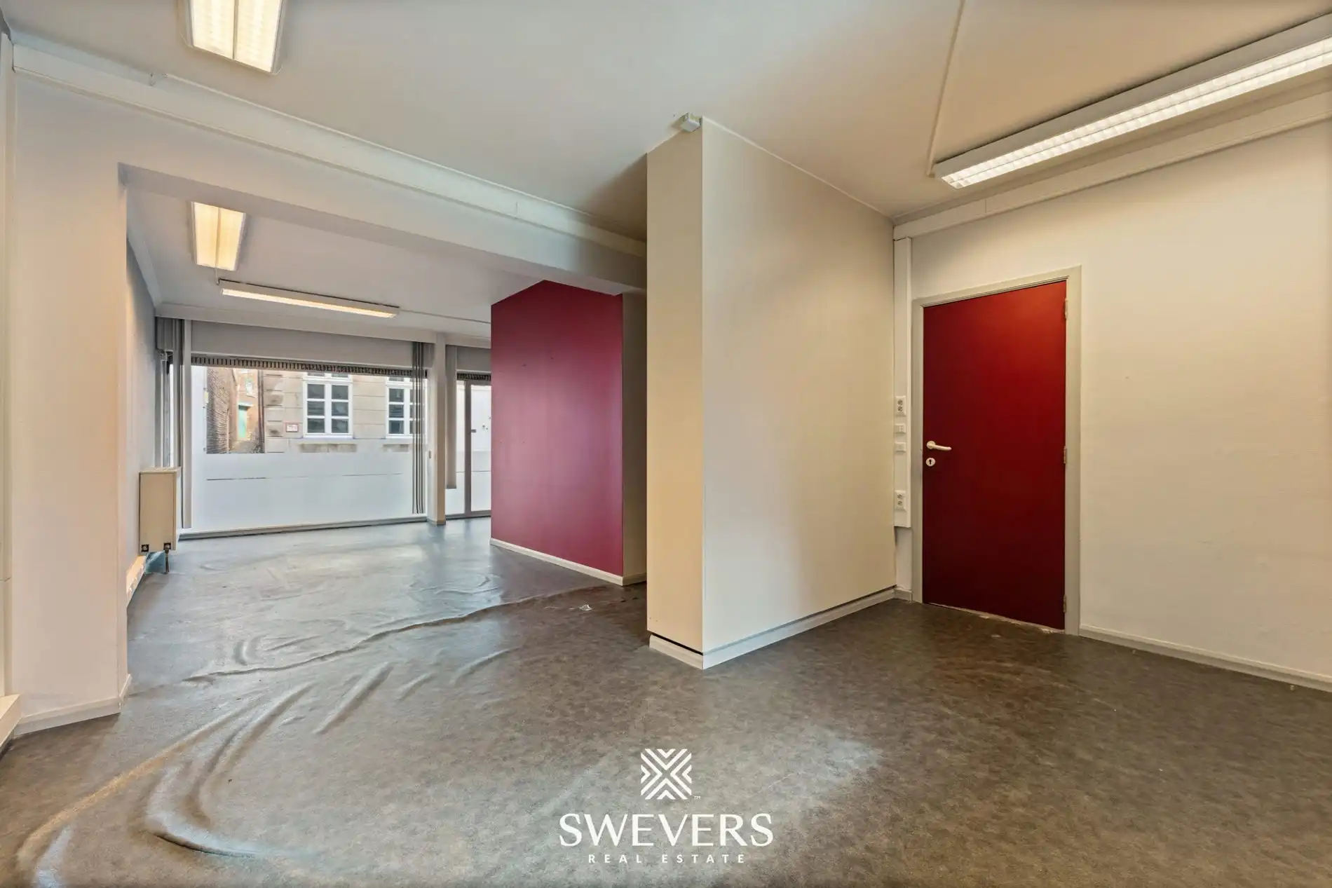 Authentiek pand (°1850) ruim duplex appartement met handelsruimte foto 5