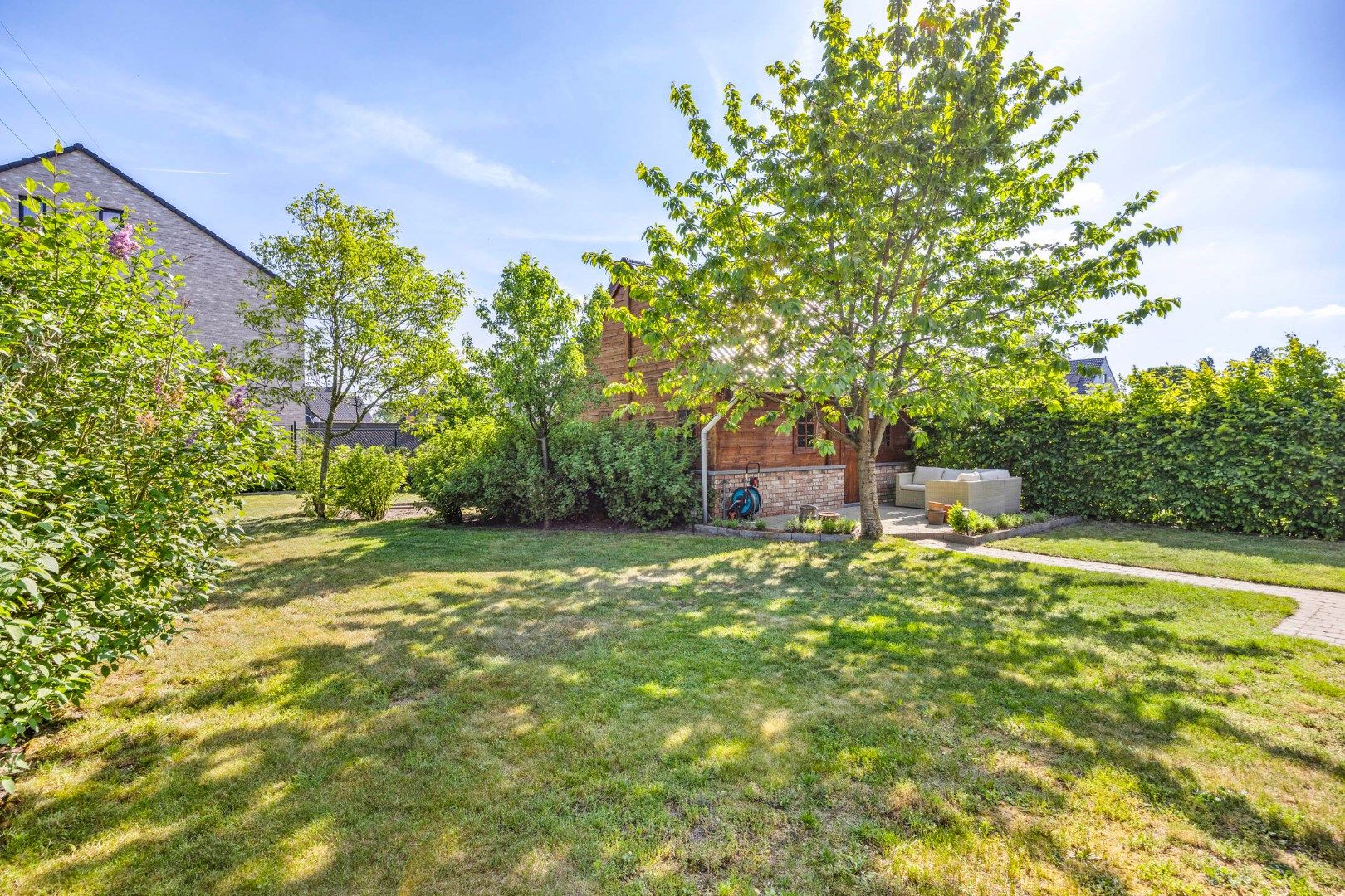 Instapklare woning met 3 SLPKS en zon georiënteerde tuin !  foto 29