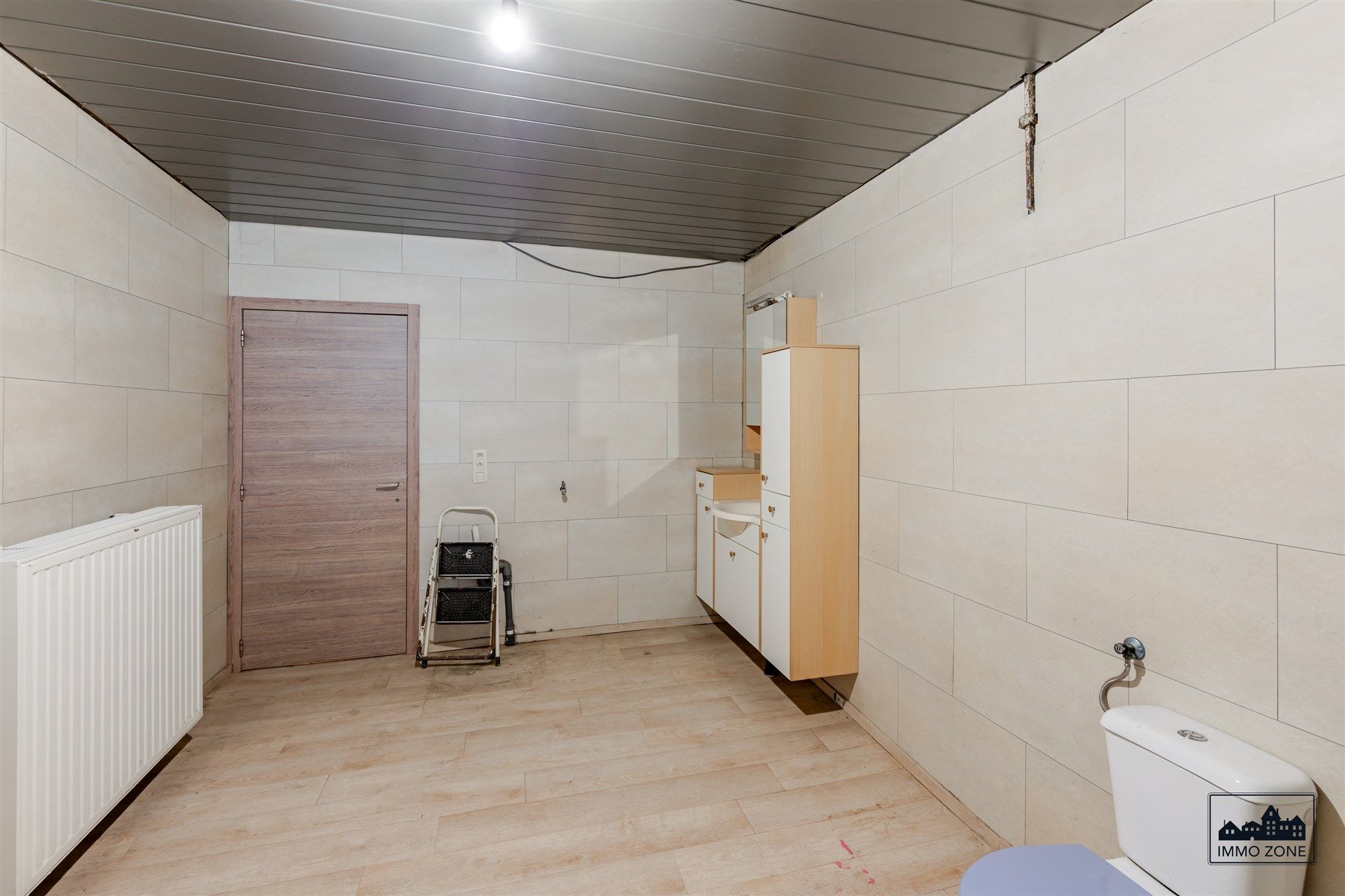 Te renoveren woning in centrum Hamme met veel potentieel foto 10