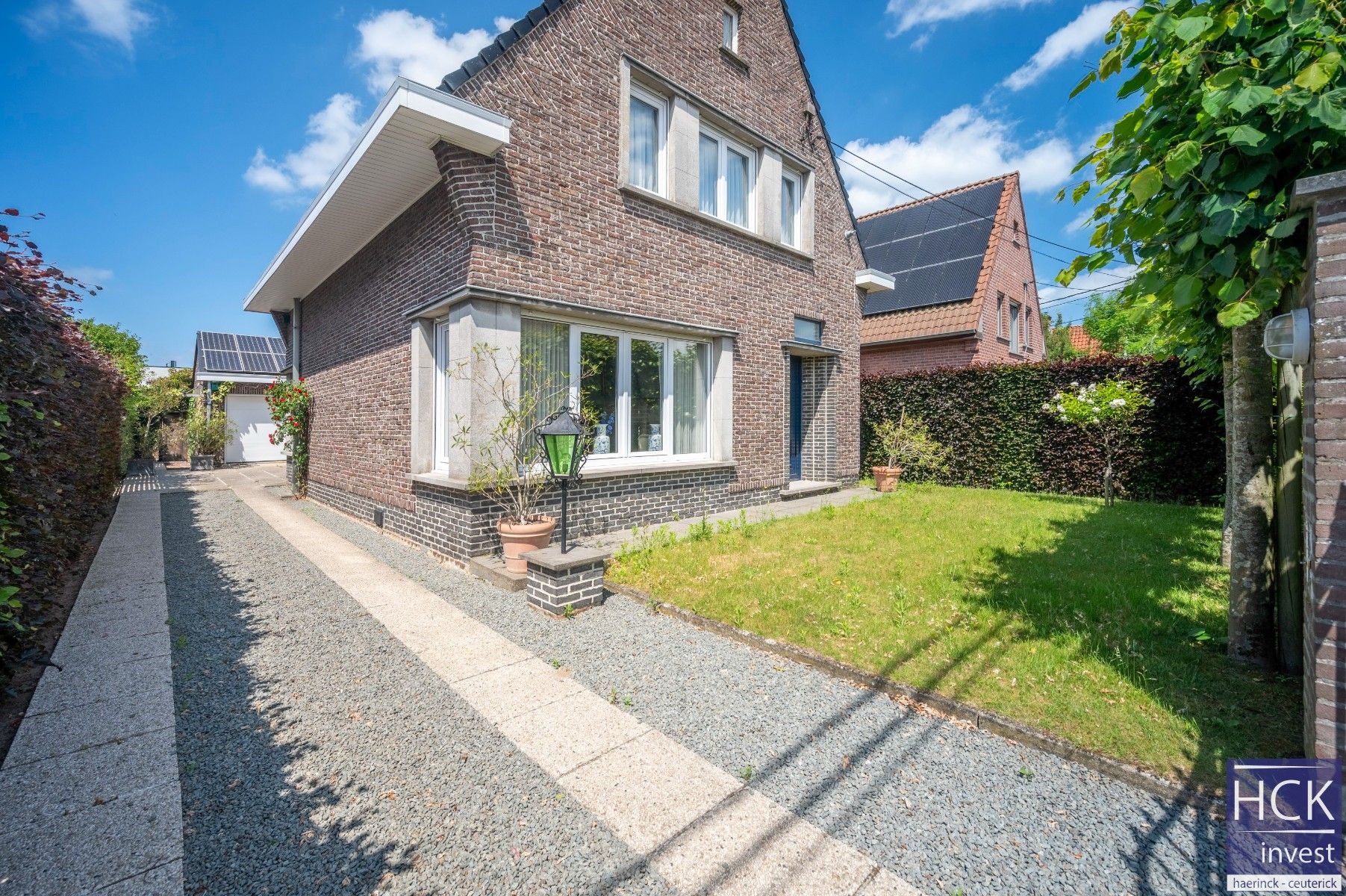 DEINZE - Alleenstaande villawoonst met 3 SLPK, tuin en garage foto 2