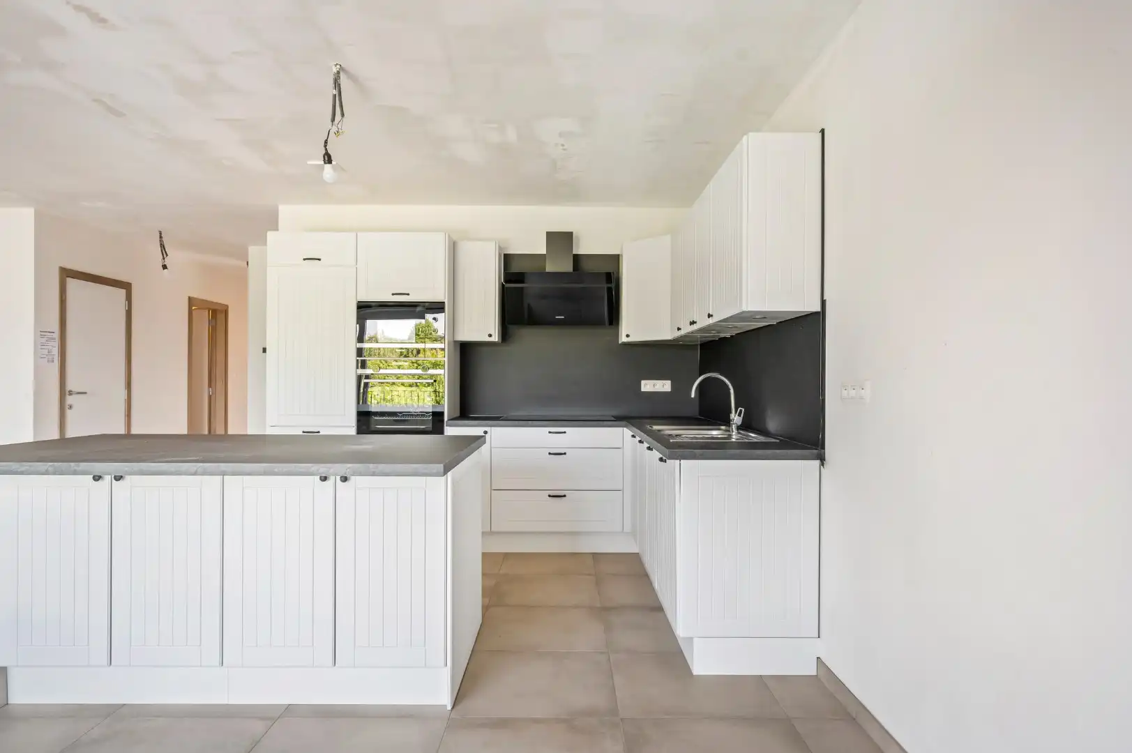 NIEUWBOUWAPPARTEMENT MET EPC A, 3 SLPKS EN 2 ZONGERICHTE TERRASSEN foto 2