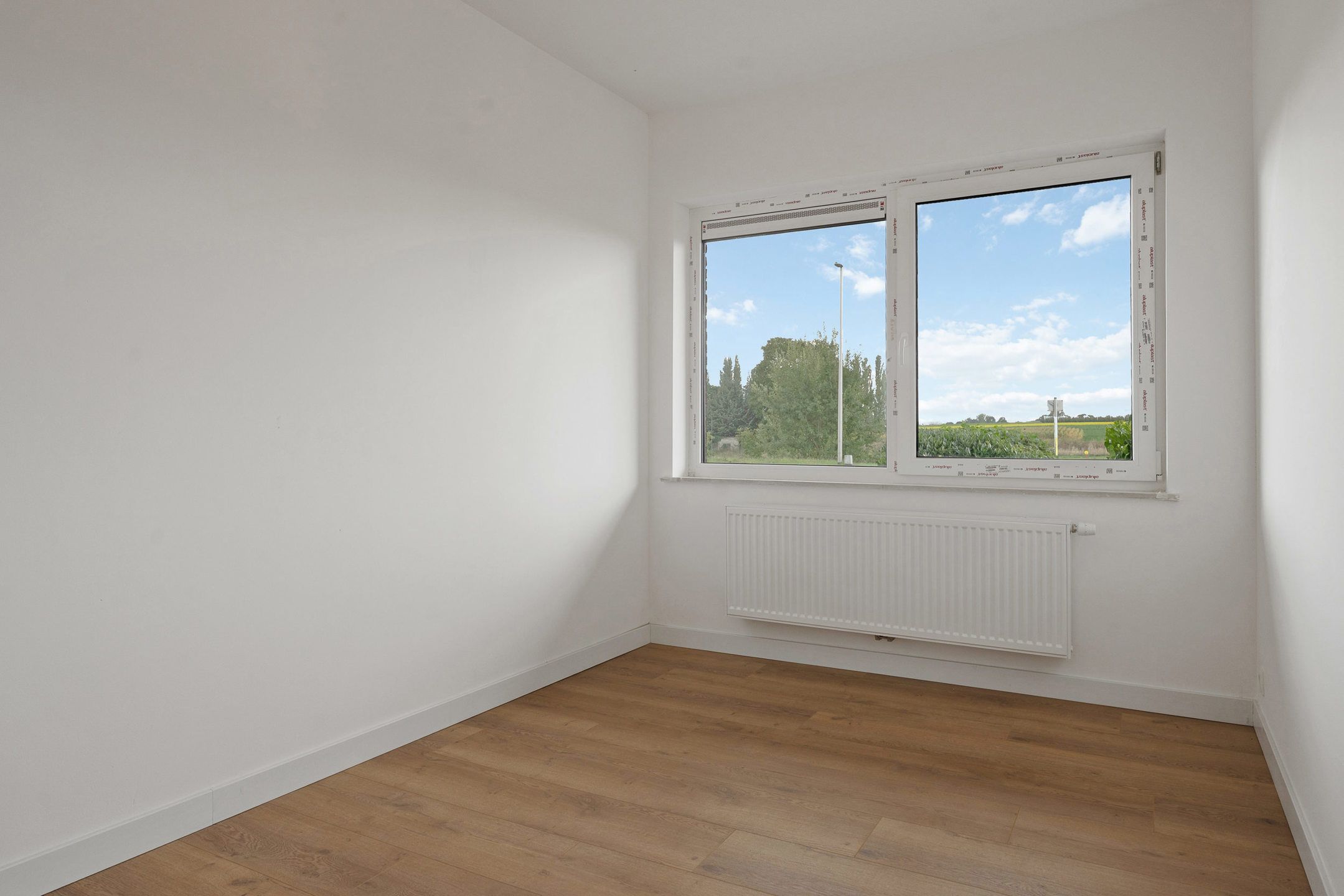 Recent gerenoveerde 4-gevelwoning te Riemst foto 11