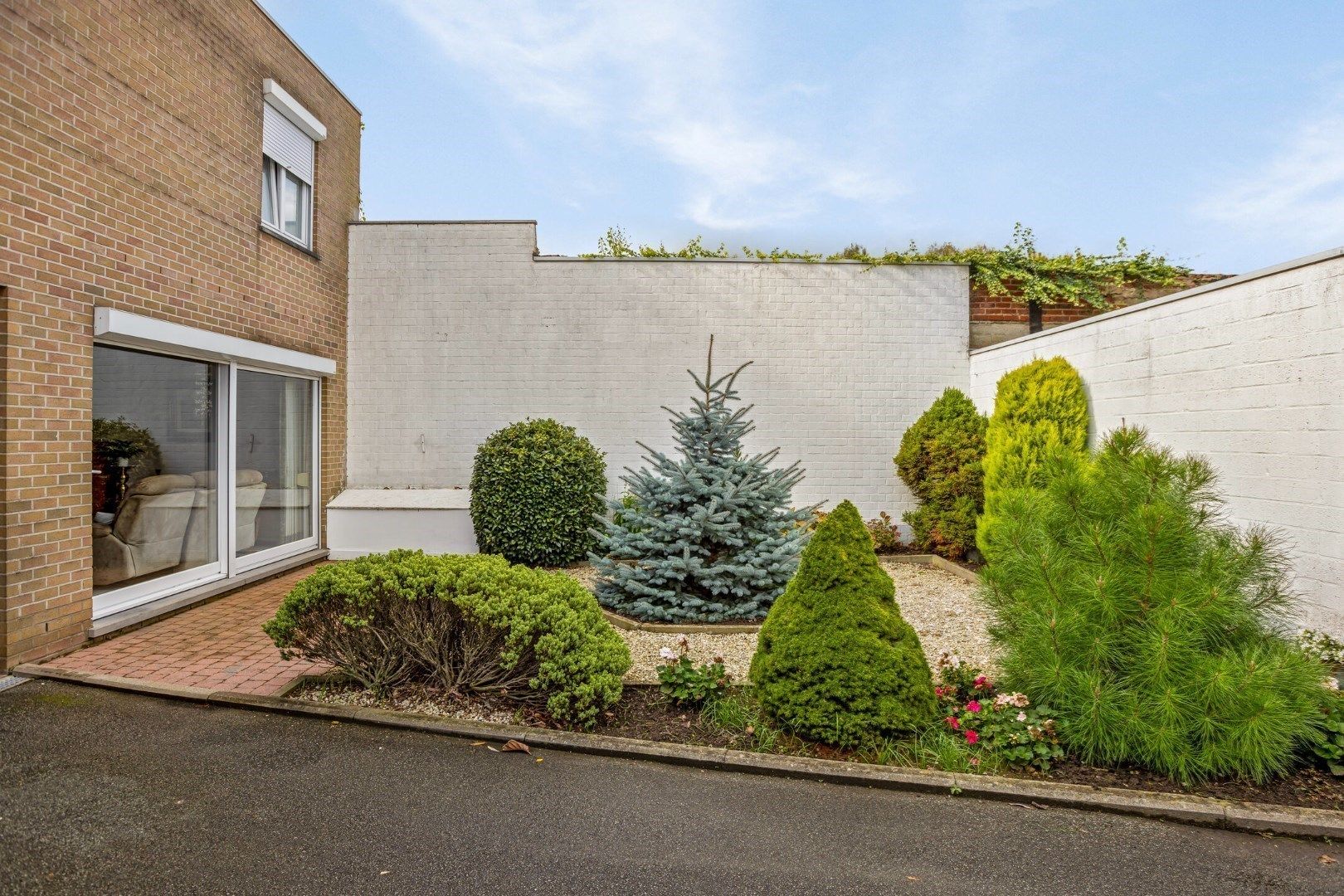 Heel aangenaam, lichtrijk gelijkvloers appartement met tuin én garage! foto 18