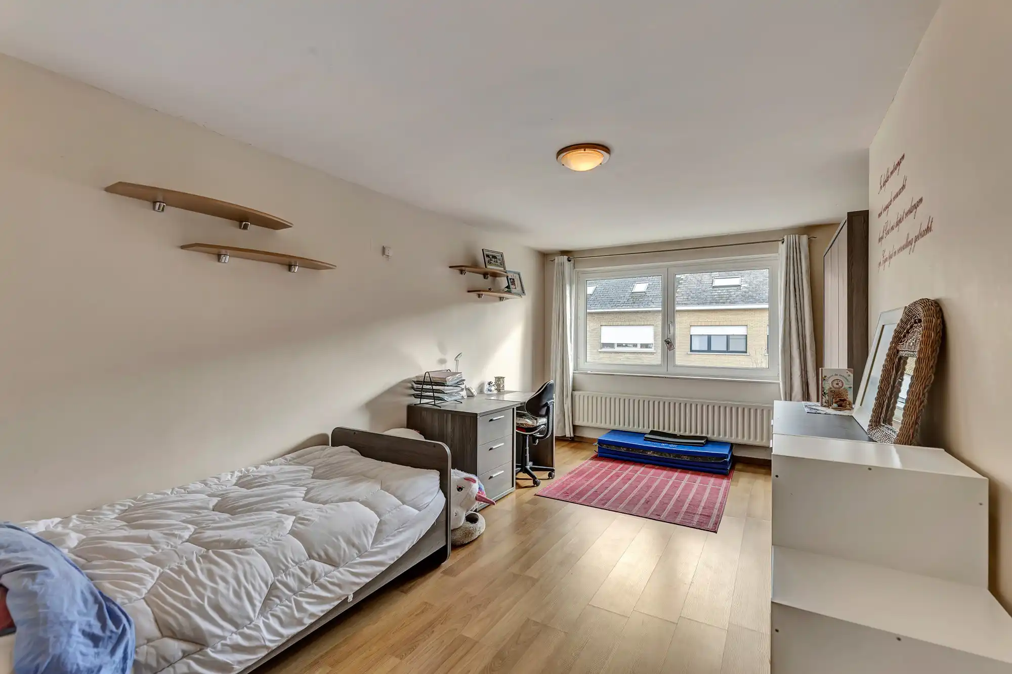 Gezellige gezinswoning met veranda, tuin en garage te koop foto 14