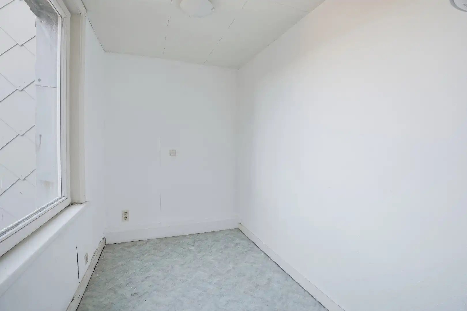 Goed gelegen gebouw op 117m² te De Panne bestaande uit een handelsruimte en woonst.  foto 21